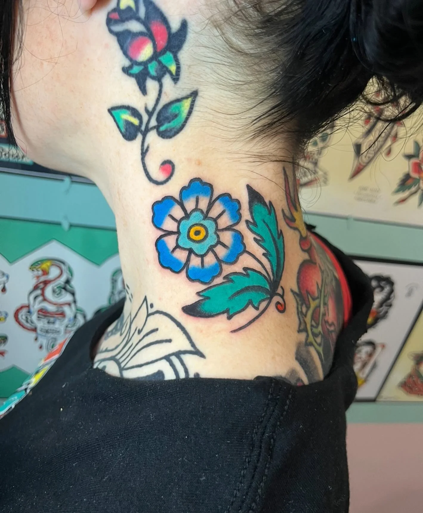 Blue flower on the neck done by @juliacampione 🌈🌈🌈 FOR BOOKING&mdash; campionetats@gmail.com
#chicago #chicagotattooartist #chicagotattooshop #lakeview #logansquare #andersonville #wickerpark #ravenswood #chicagotattoos #chicagotattooartists #tatt