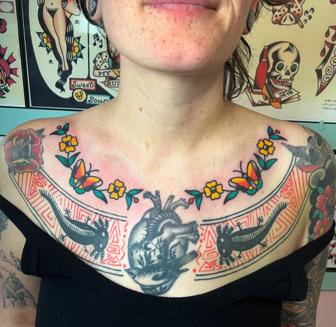 Added a flower &amp; butterfly chain above an existing chest piece 🦋 Thank you!
Done today at @good.omen.tattoo 🕉️

#chicagotattooartist #chicagotattooer #chicagotattooshop #ladytattooers