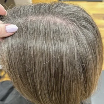 after a french blending session that added dimension and depth to soften the look of grey hair