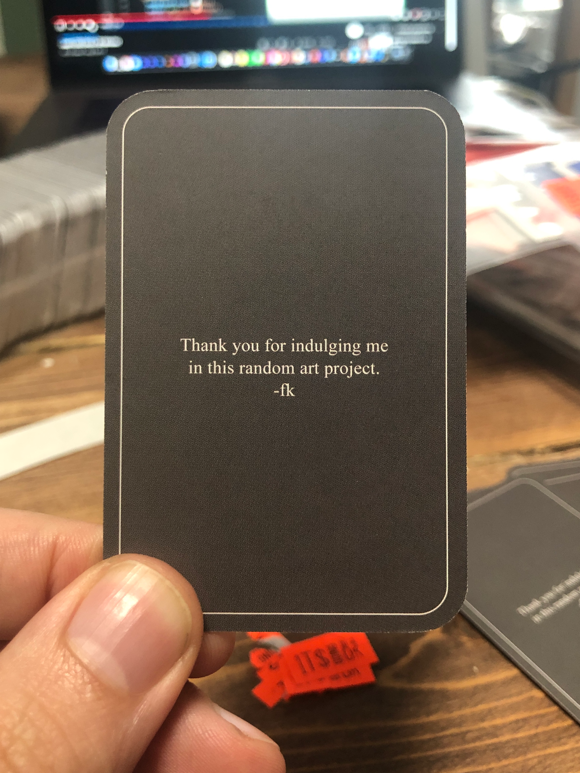 card in hand back.png