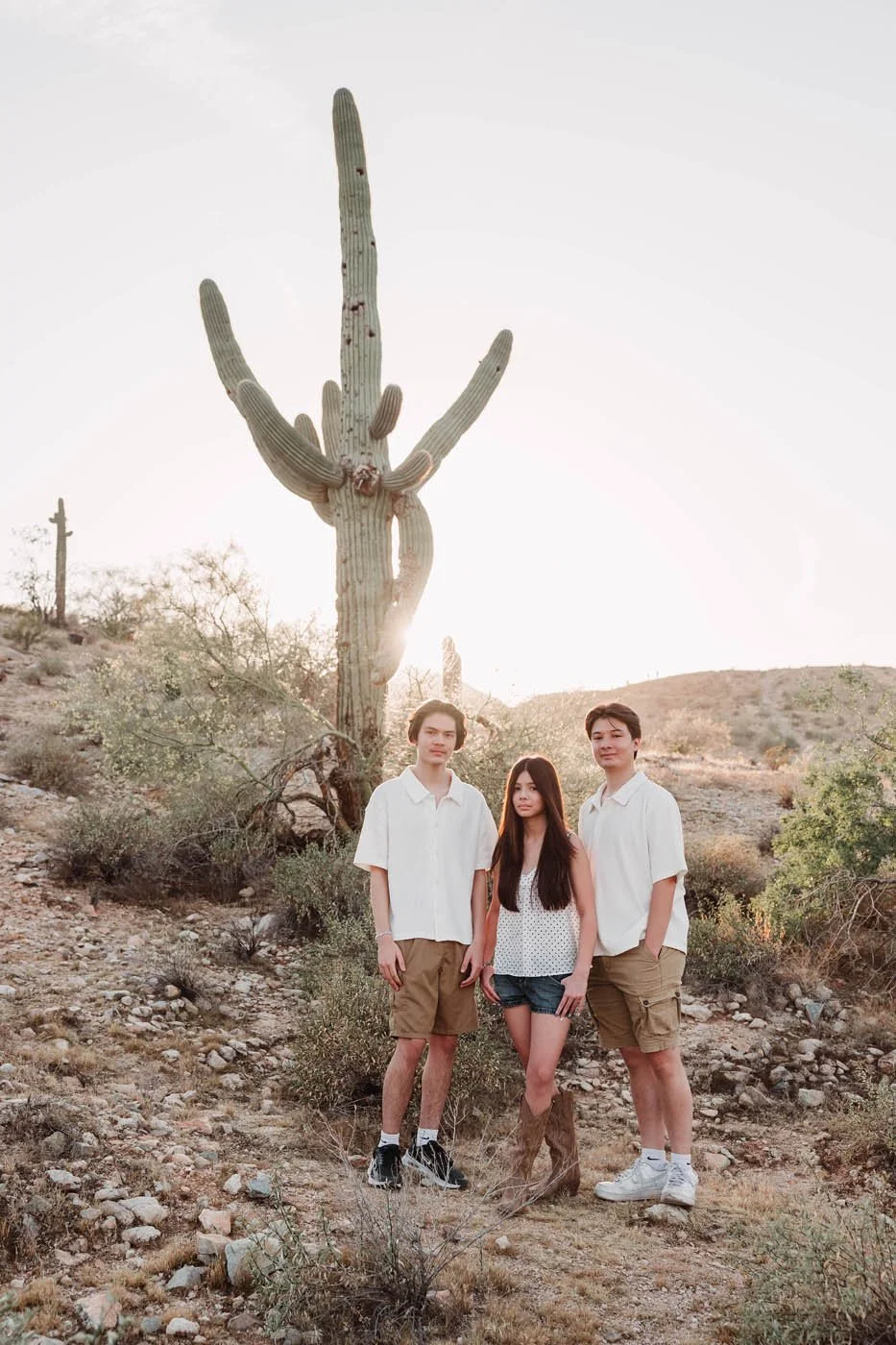 Sibling photos with saguaro cactus on South Mountain in Phoenix