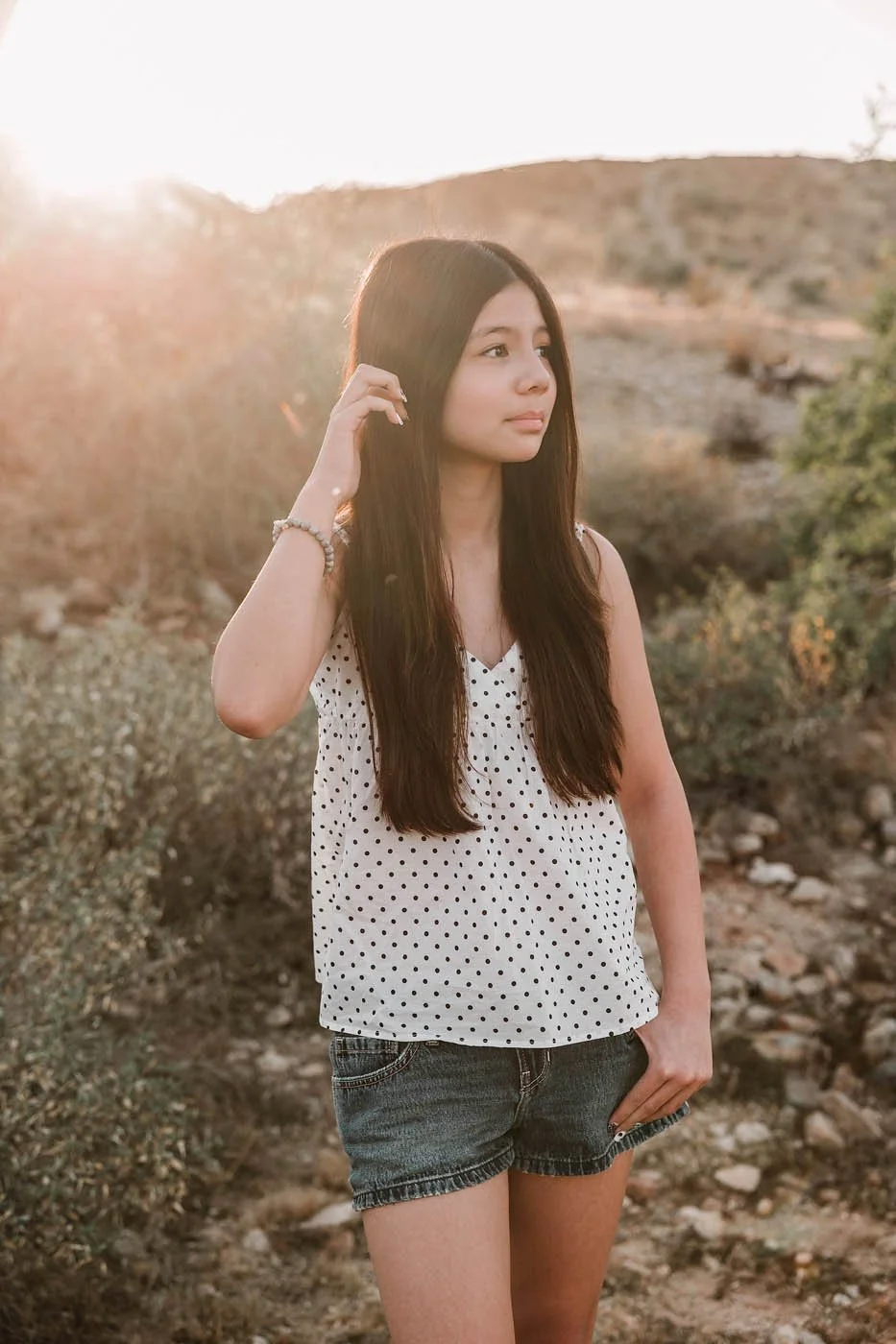 teen girl at phoenix south mountain at sunset