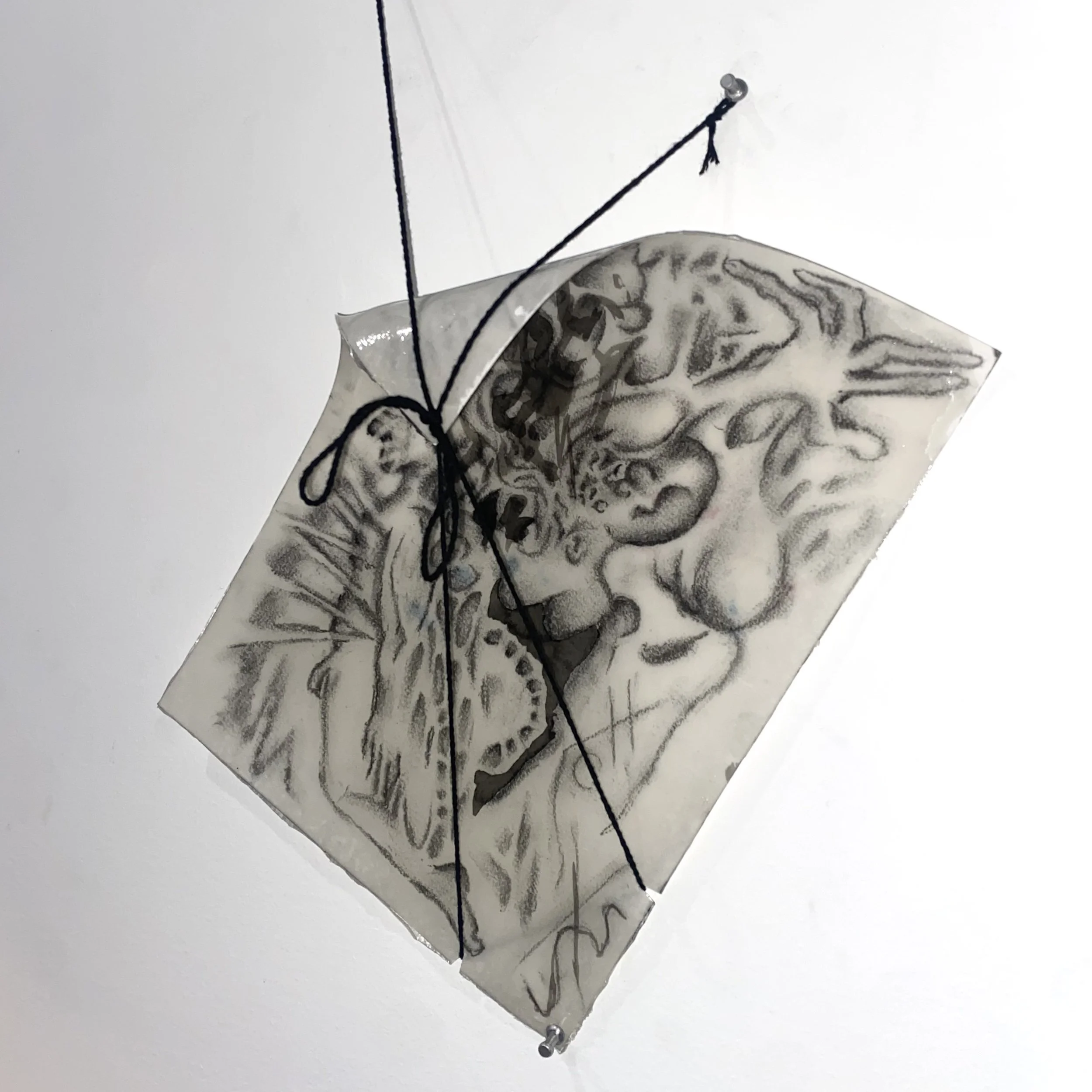 Enfold (Tension Drawing I), 2025, charcoal and ink on paper, resin coating, string