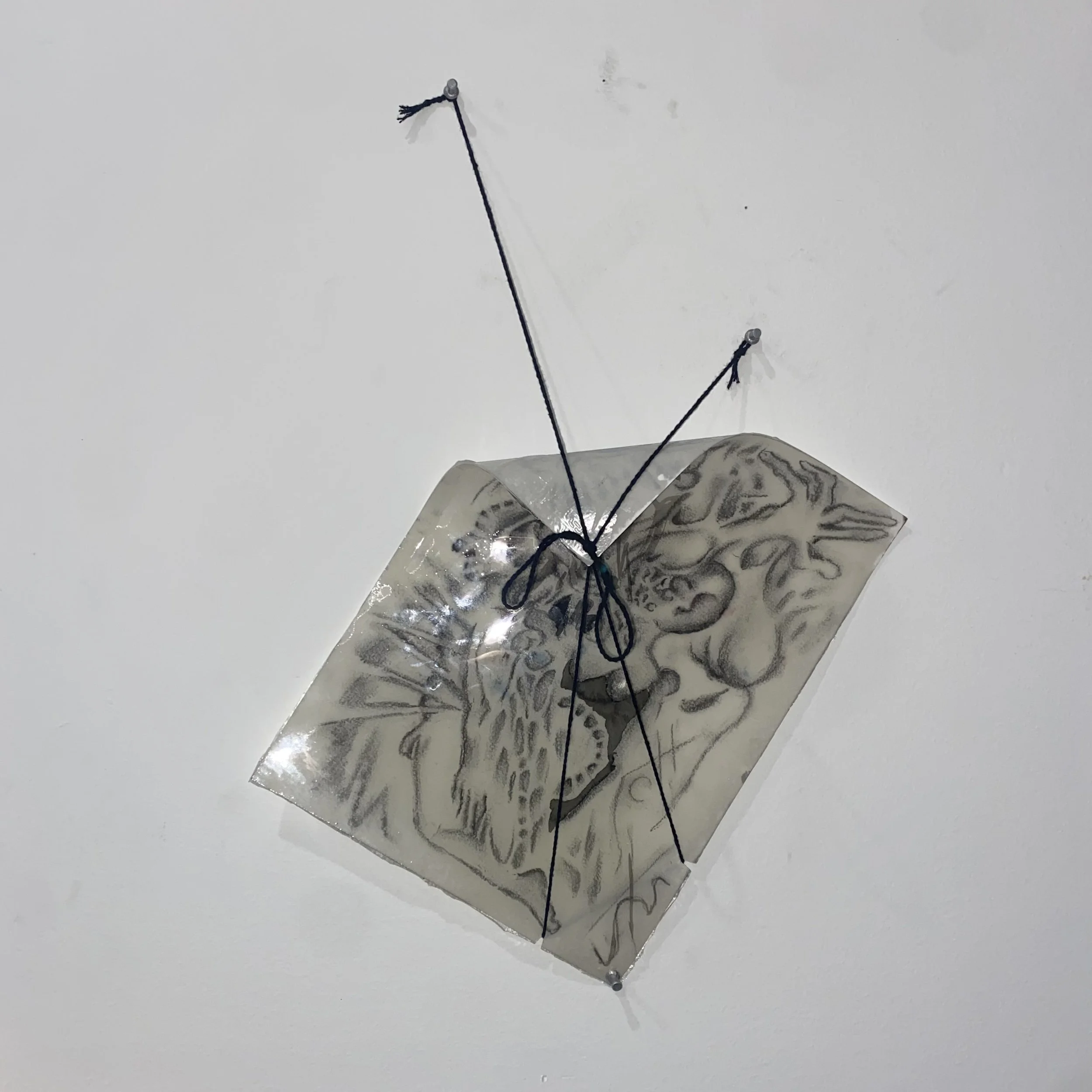 Enfold (Tension Drawing I), 2025, charcoal and ink on paper, resin coating, string