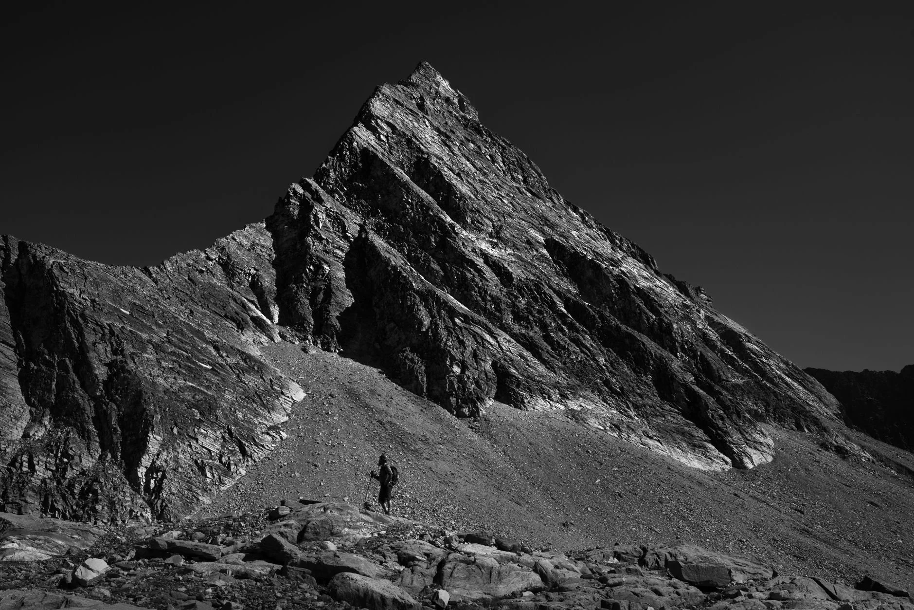 Mount Sir Donald Series Two. Hiker walking through rocky tundra in Columbian Valley, British Columbia