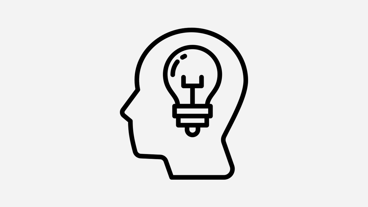 Head with lightbulb icon