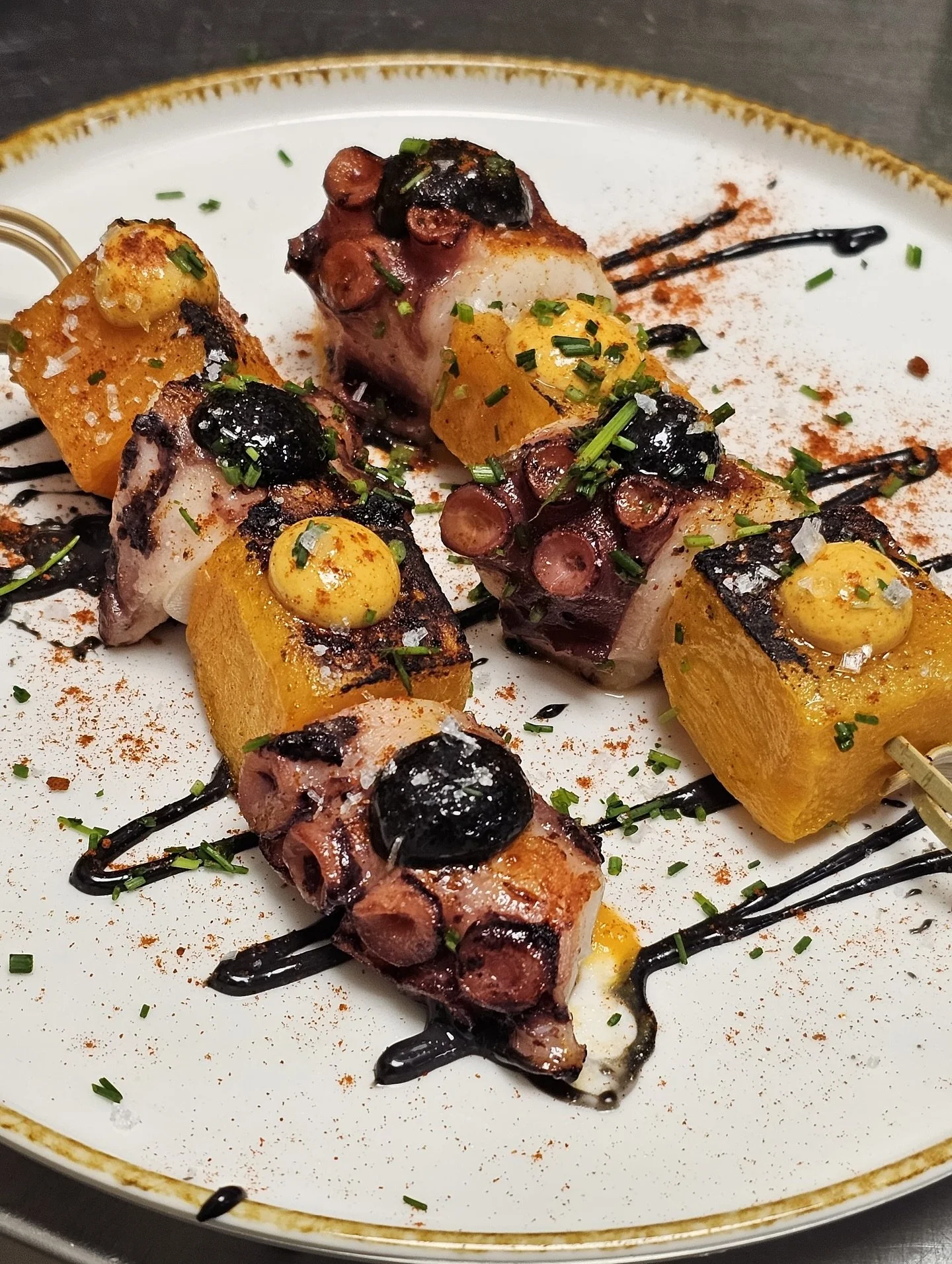 🎃✨ A taste of our D&iacute;a de los Muertos Special Menu 🕯️

🐙 Octopus &amp; Roasted Pumpkin Skewer &mdash; with black aioli and a silky pumpkin reduction.

🐟 Sea &amp; Mountain: Hake Tikin Xic Style &mdash; topped with crispy pork crackling shav