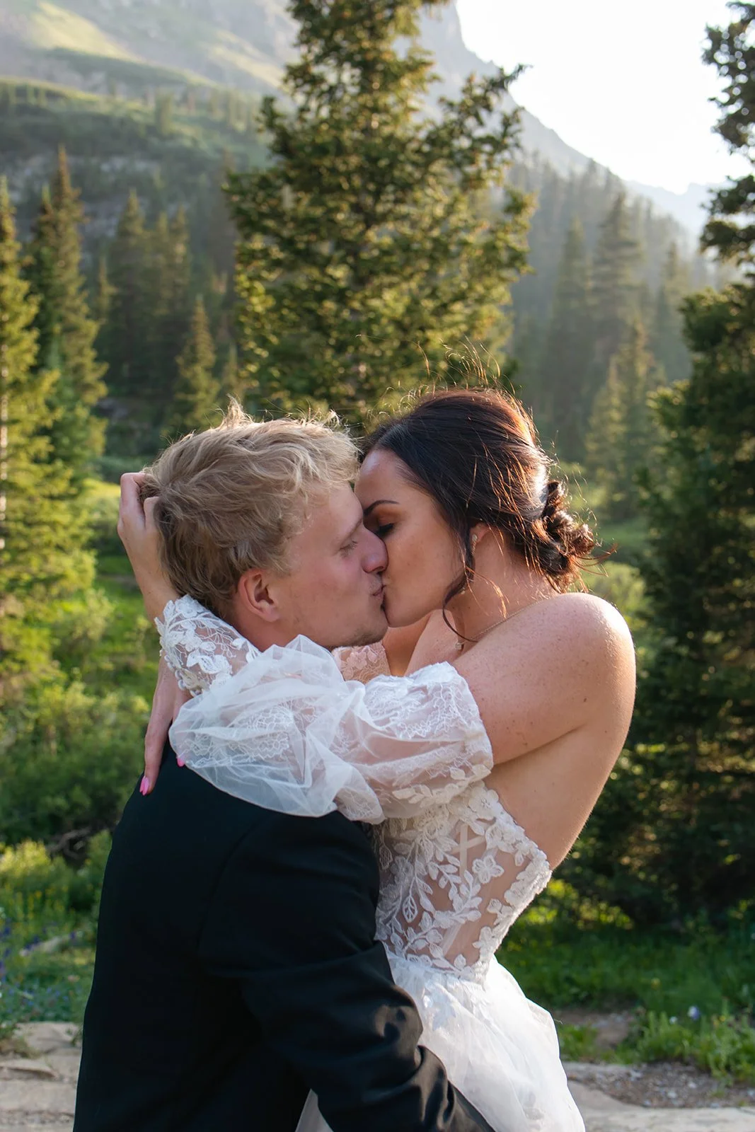 bride and groom kissing