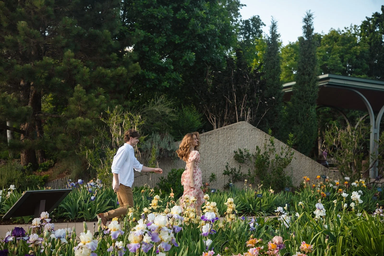 a couple running on a path through the Botanic Gardens in Denver 