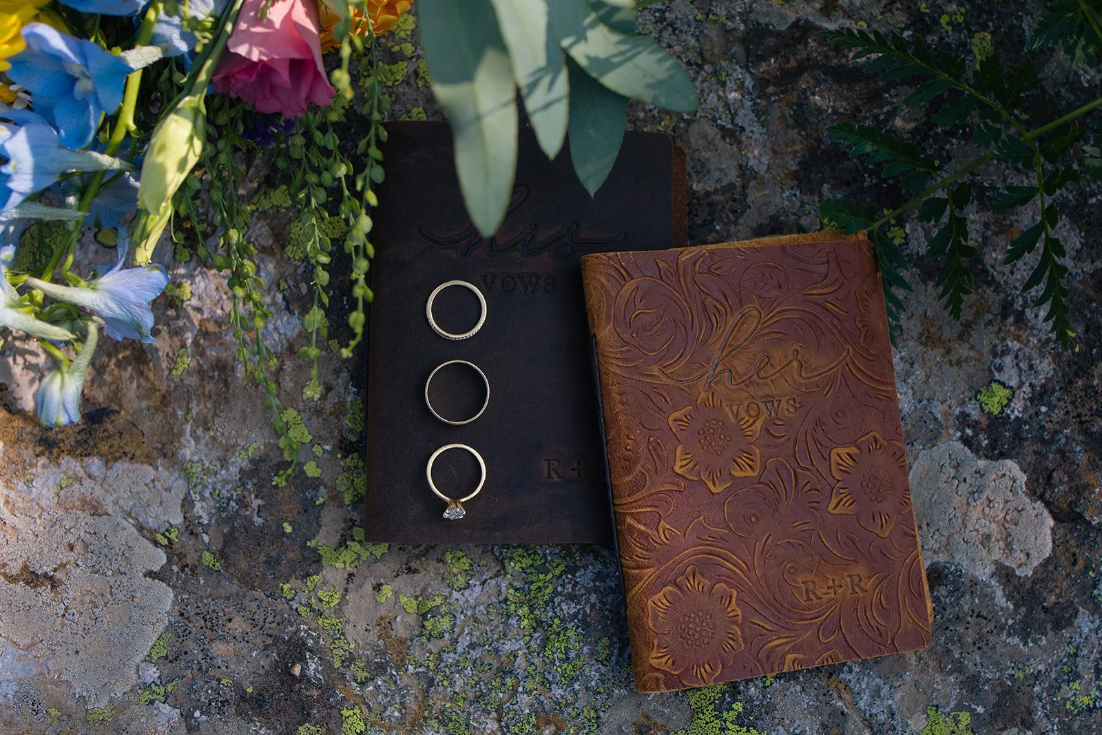 jewel toned florals, vow books and jewelry laid out for Wedding Detail Photos