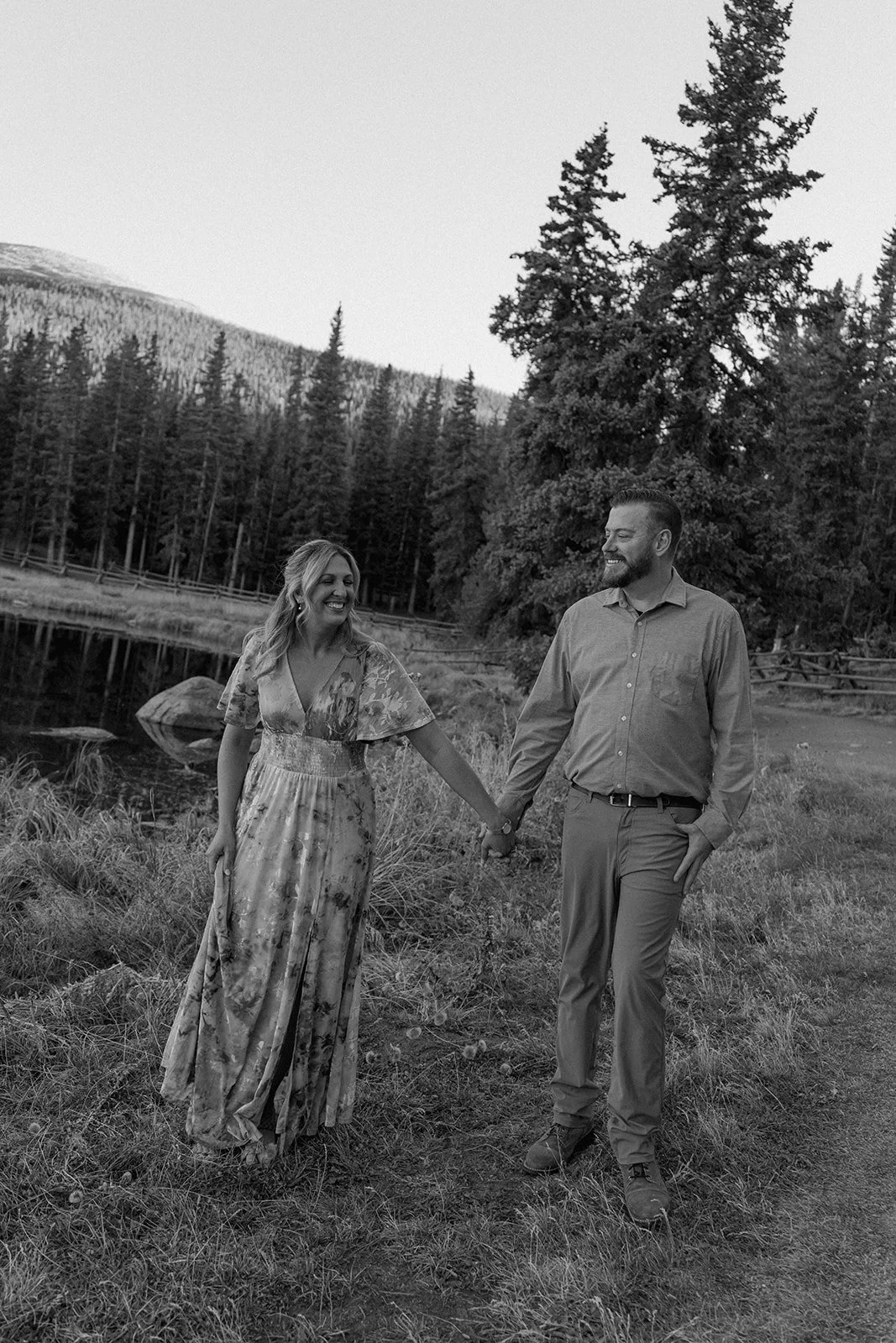 a couple walking by echo lake during their engagement photos