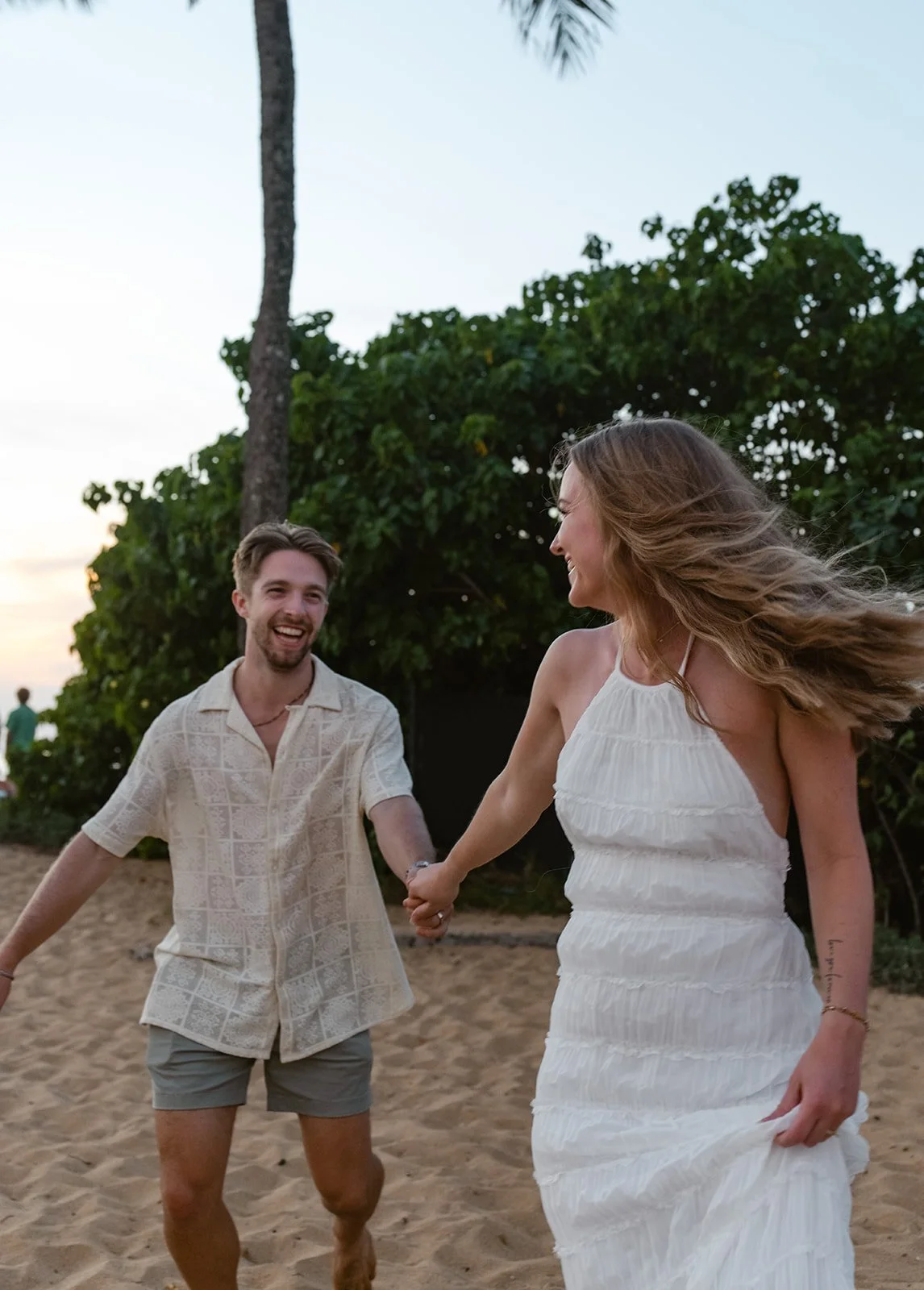 neutral and flowy Engagement Photo Outfits on the beach