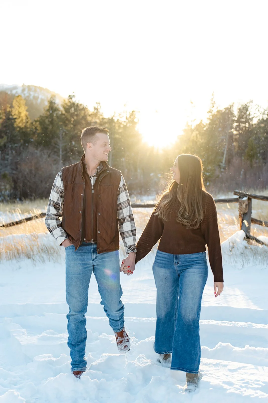 a couple in brown toned Engagement Photo Outfits in Colorado