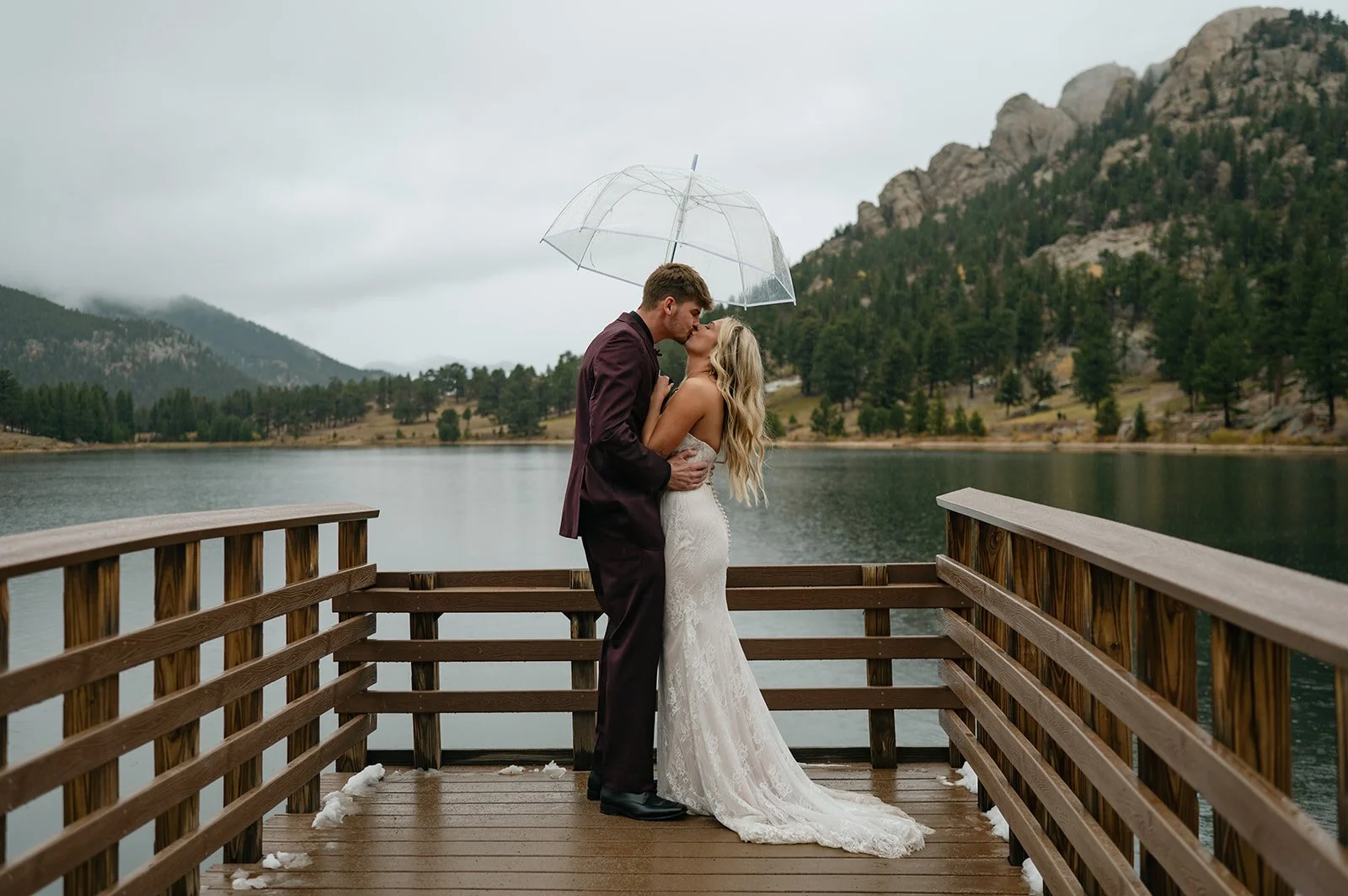 moody elopement portraits as it rains in Colorado