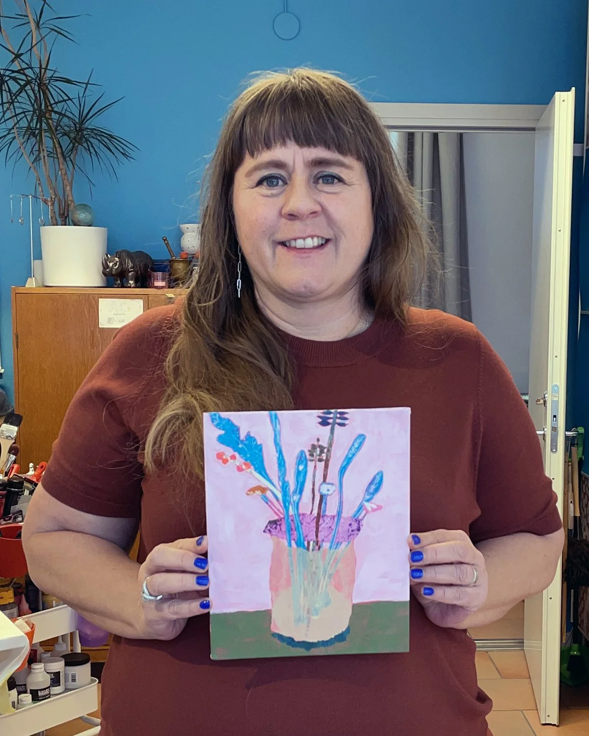 Ann-Charlotte med ett collage