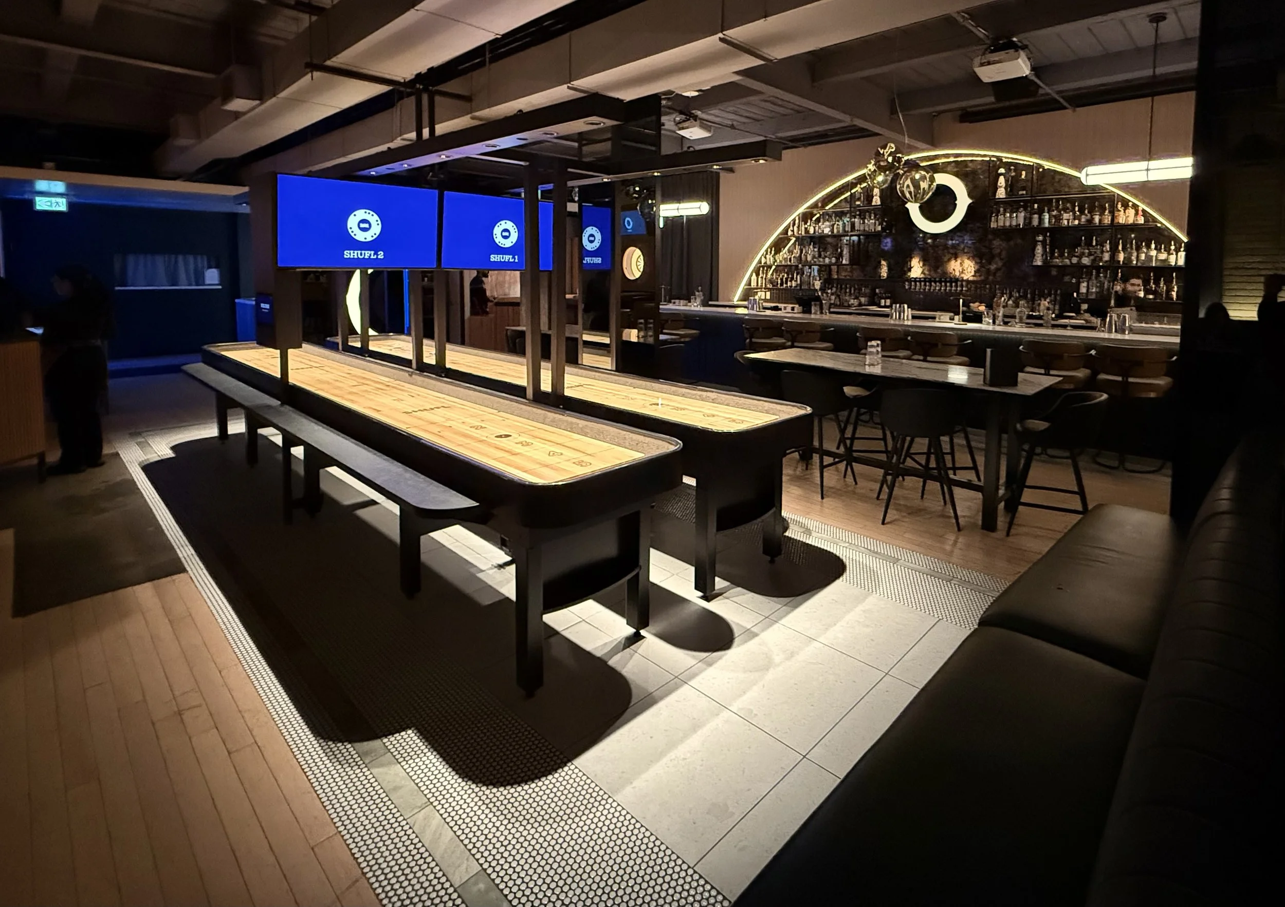 OCHE Restaurant and Bar on King Street, Toronto. From an epmty warehourse, Toman Interiors designed a modern, yet cozy atmosphere to eat, drink, sing karaoke, and play darts! A hot new spot in the city for date night and corporate events.