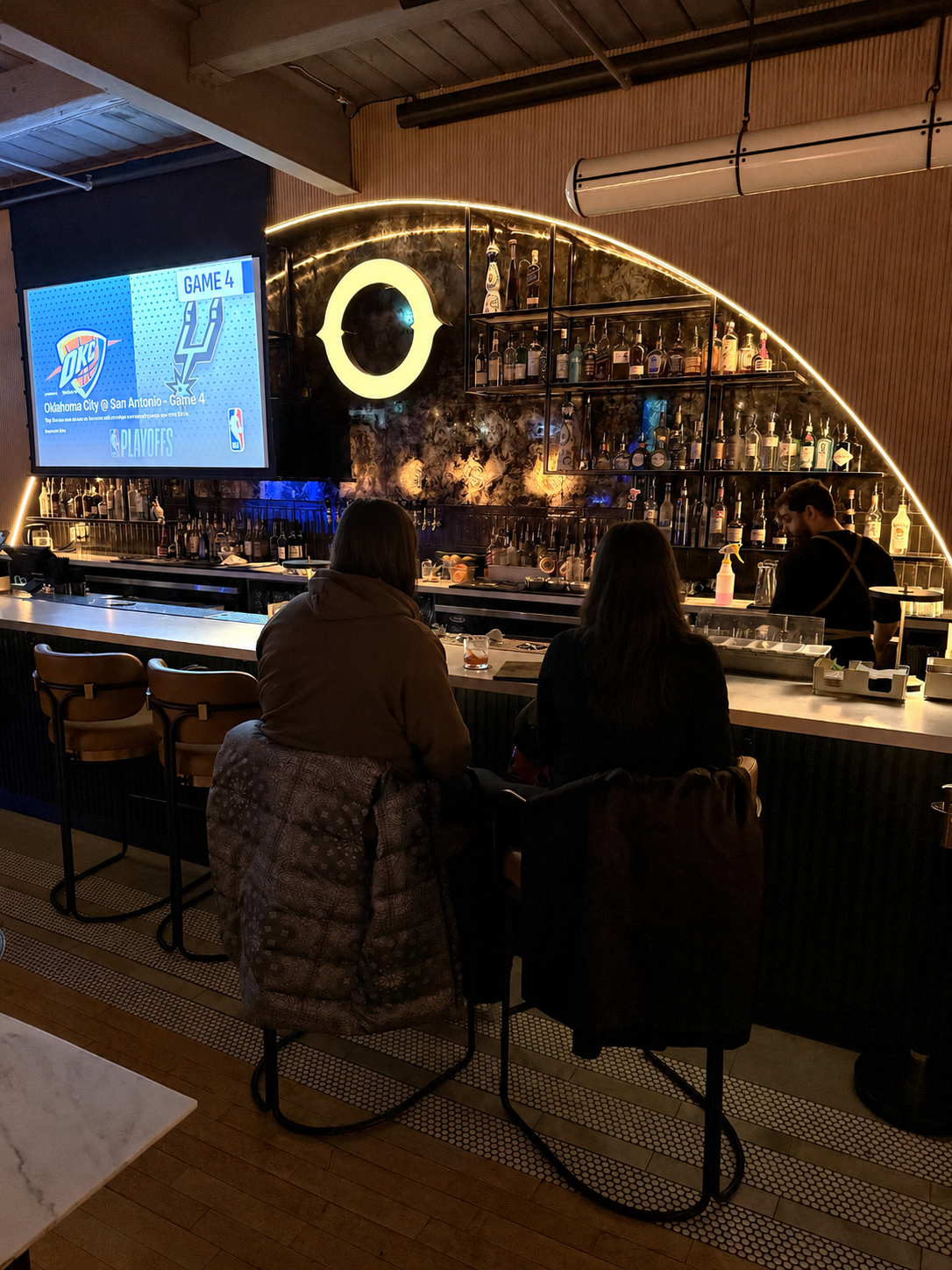Oche on King Street, Toronto. The bar. The main attraction with antique mirrors that create a soft glow