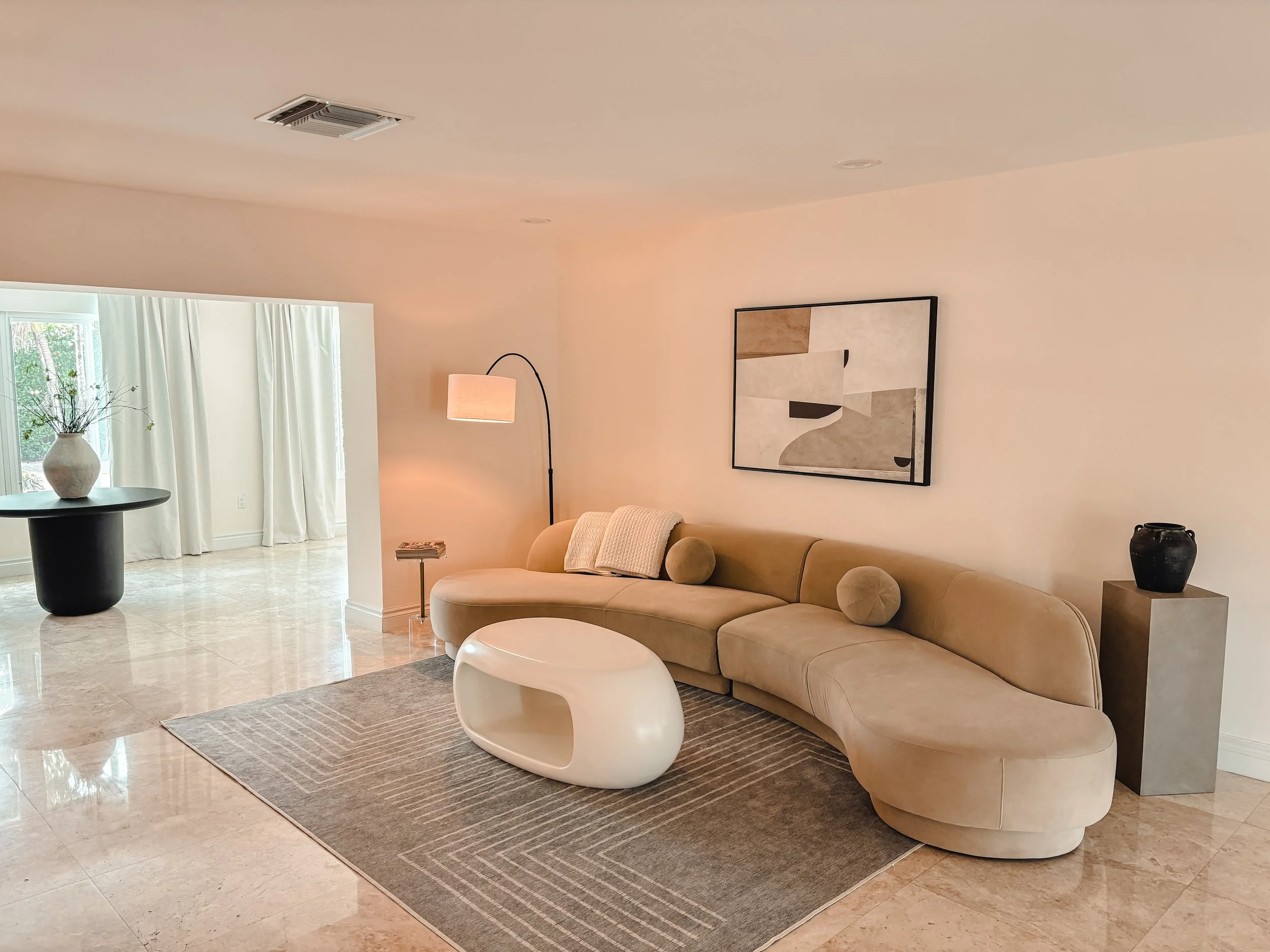 Contemporary open-plan home designed to maximize natural light, functionality, and seamless transitions between living spaces.