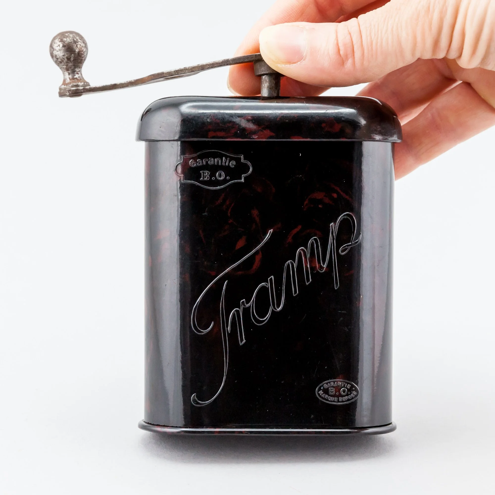 “Tramp” bakelite grinder