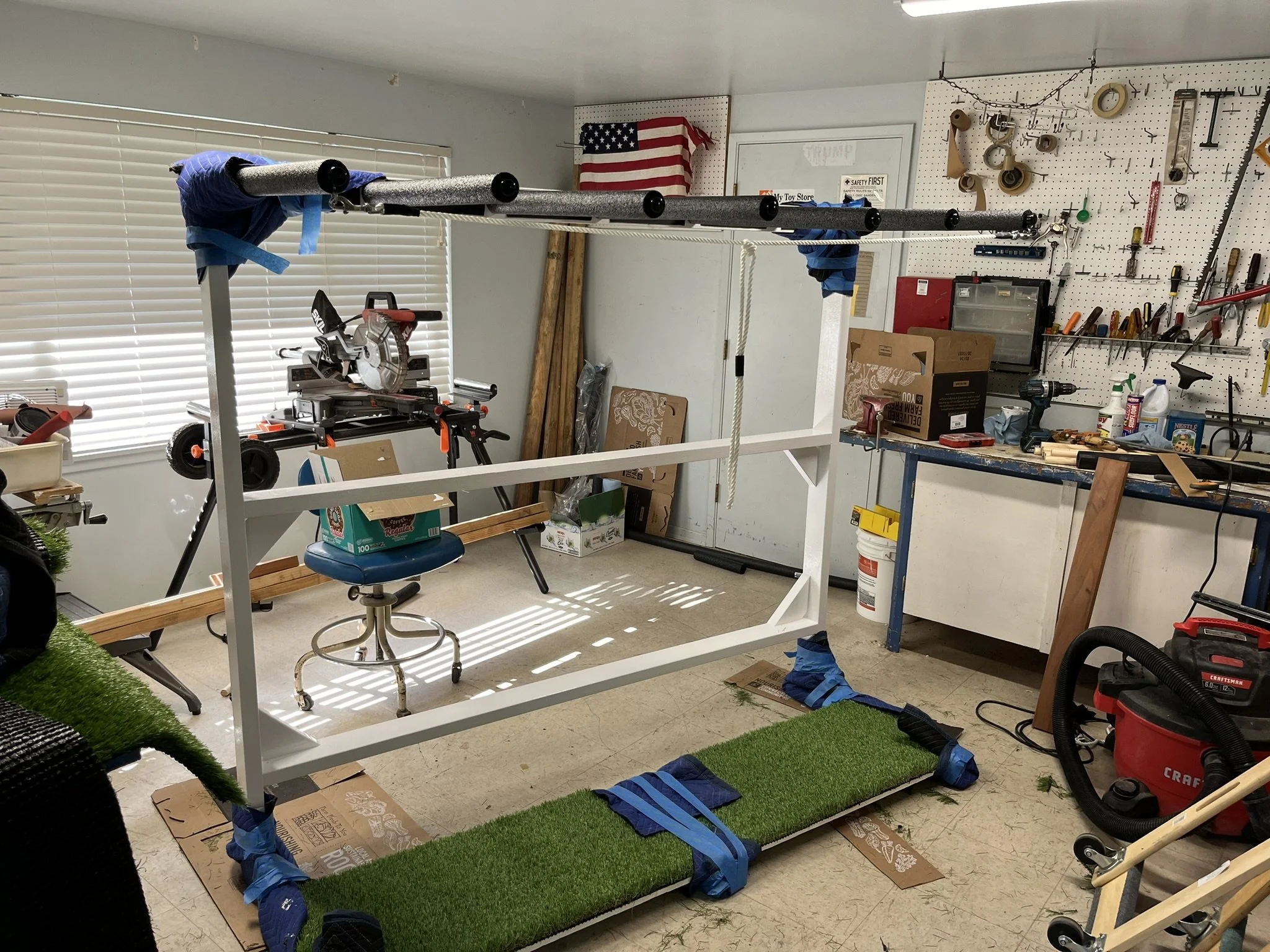 Surf Rack with custom white marine grade finish and Turf padding. 