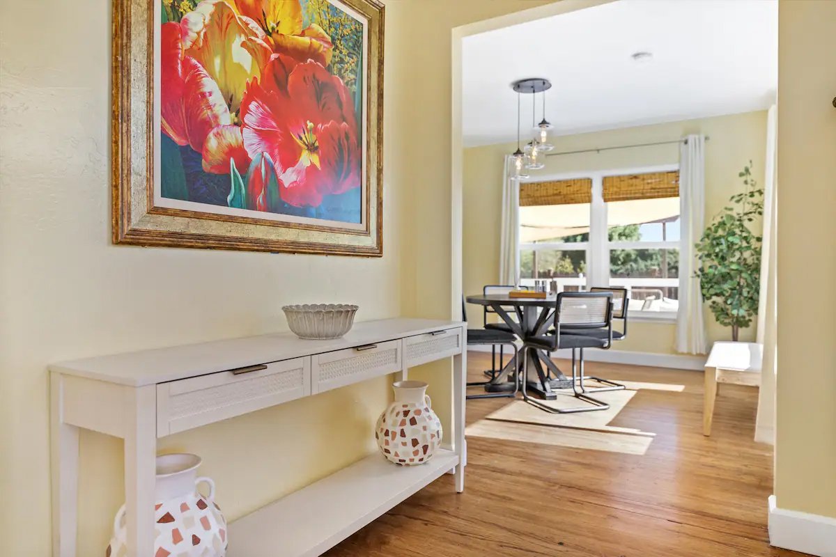 02 Entry 03 - Bright Hallway with Colorful Artwork and Modern Decor.jpg