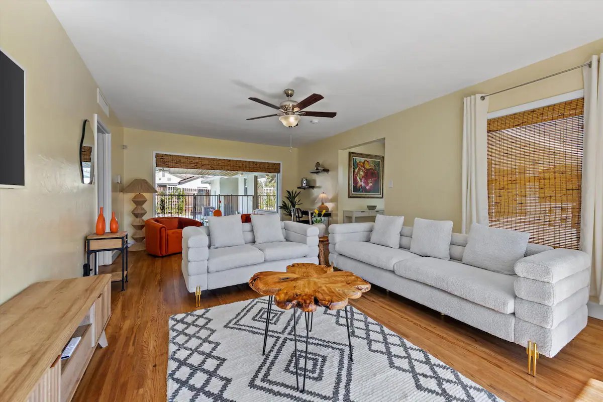 03 Living Room 04 - Spacious Living Room with Modern Decor and Cozy Seating.jpg