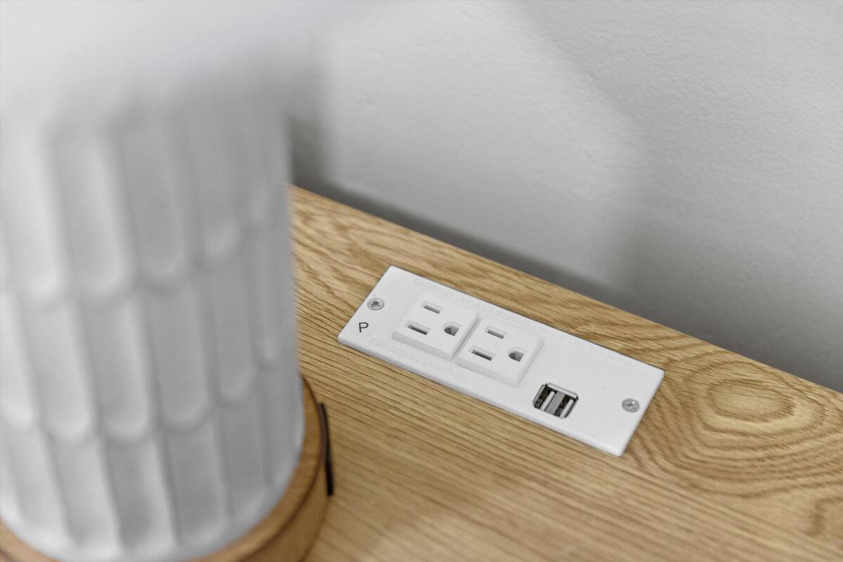 05 Bedroom 2 03 - Convenient Power Outlet and USB Charging Station.jpg
