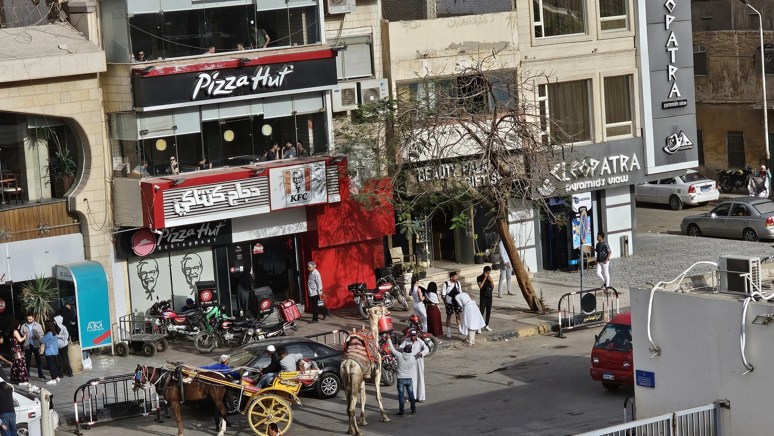 Pyramids to the right, Pizza Hut and KFC to the left