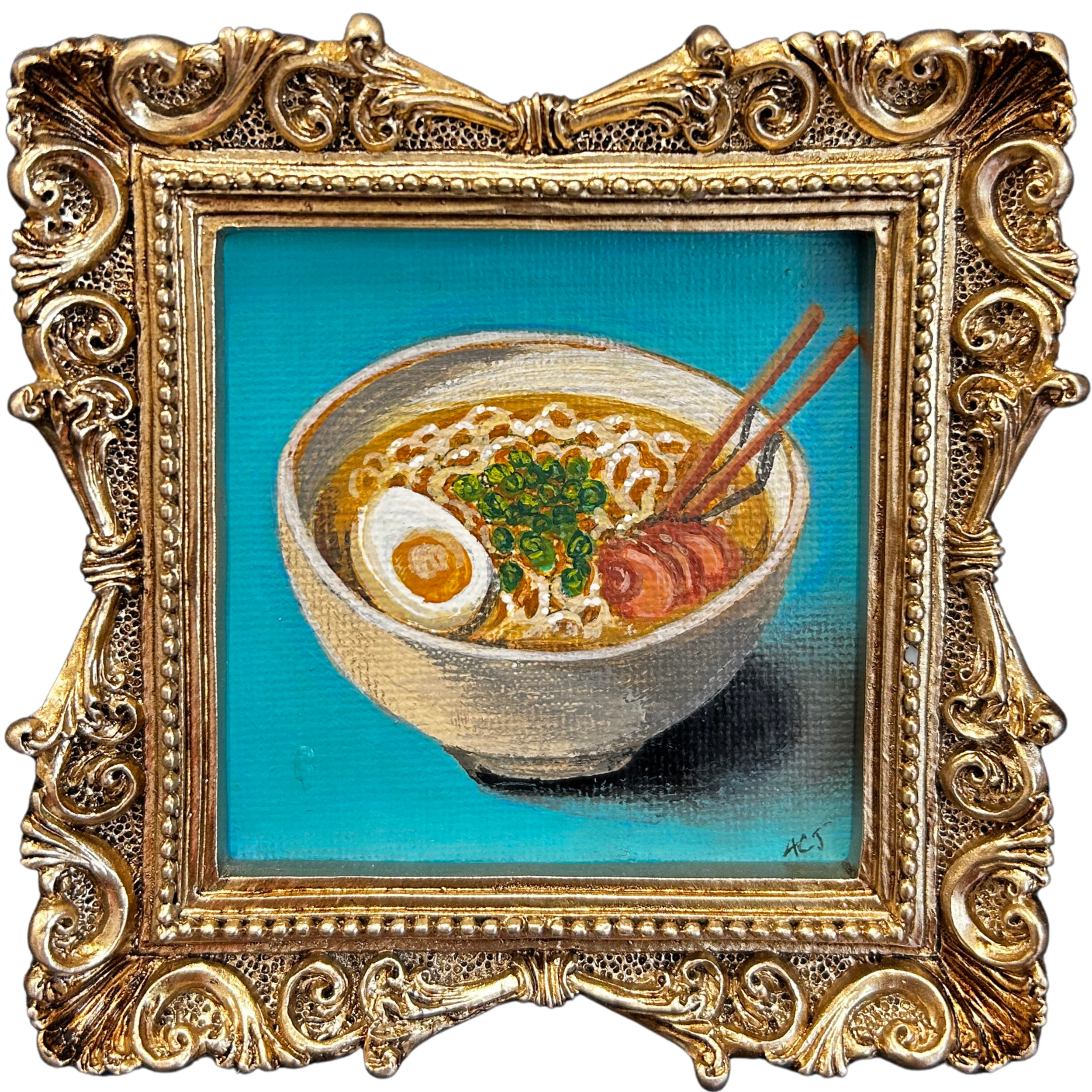 Close-up of a decorative gold ornate frame surrounding a painting of a food scene with noodles, vegetables, and chopsticks.
