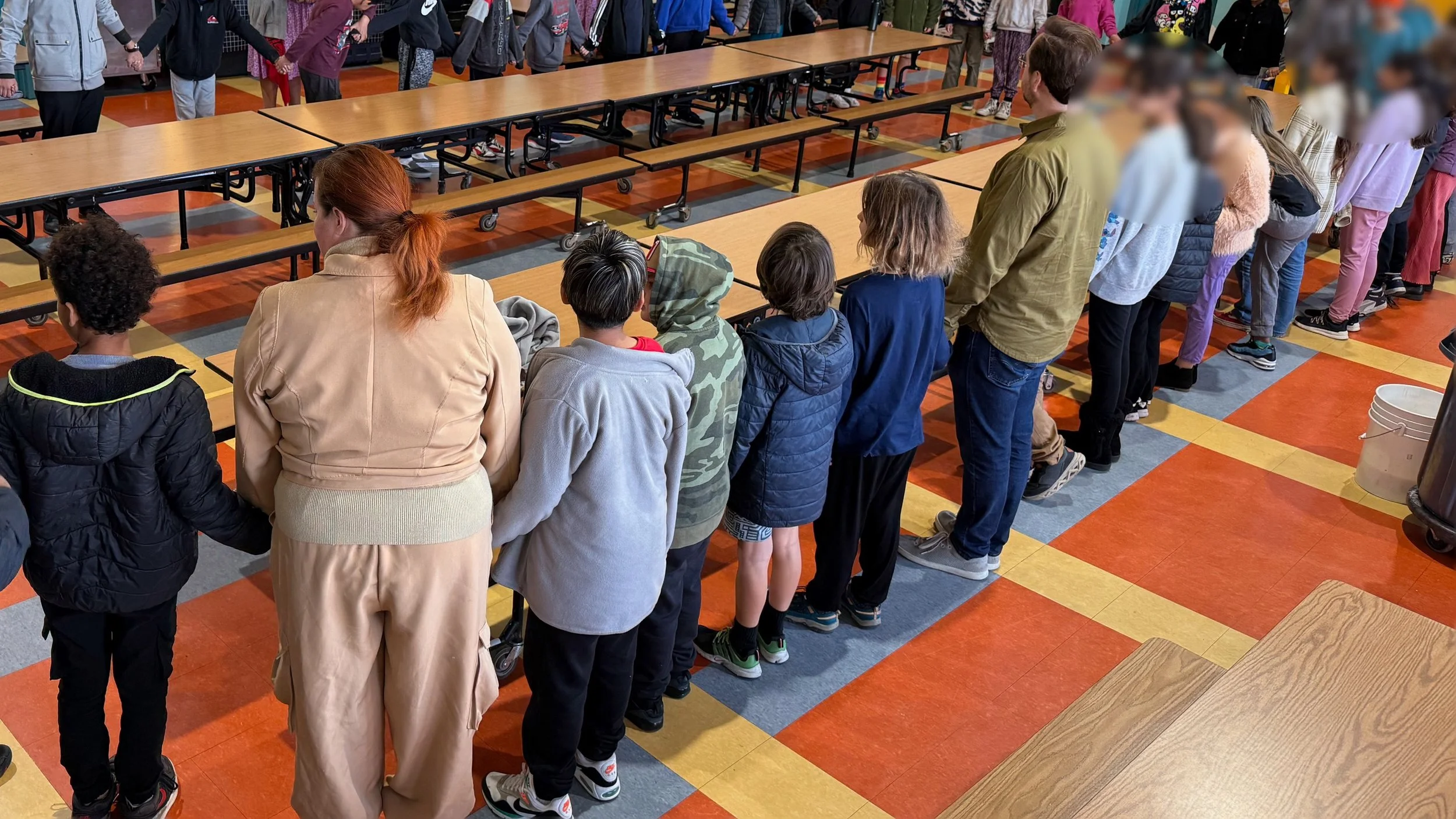 Students singing with the Ohlone Sisters