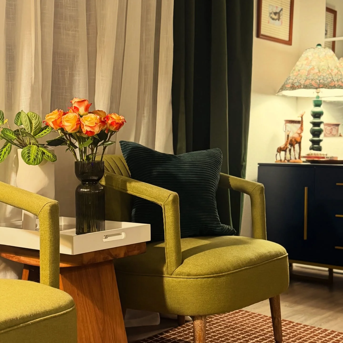 This is my favorite vignette or view of our new space. I love the lighting and the sweet little corner with my treasured lamp from @homegoods (truthfully, those green arm chairs are from Home Goods, too, maybe 6 years ago!). I love how the shades of 