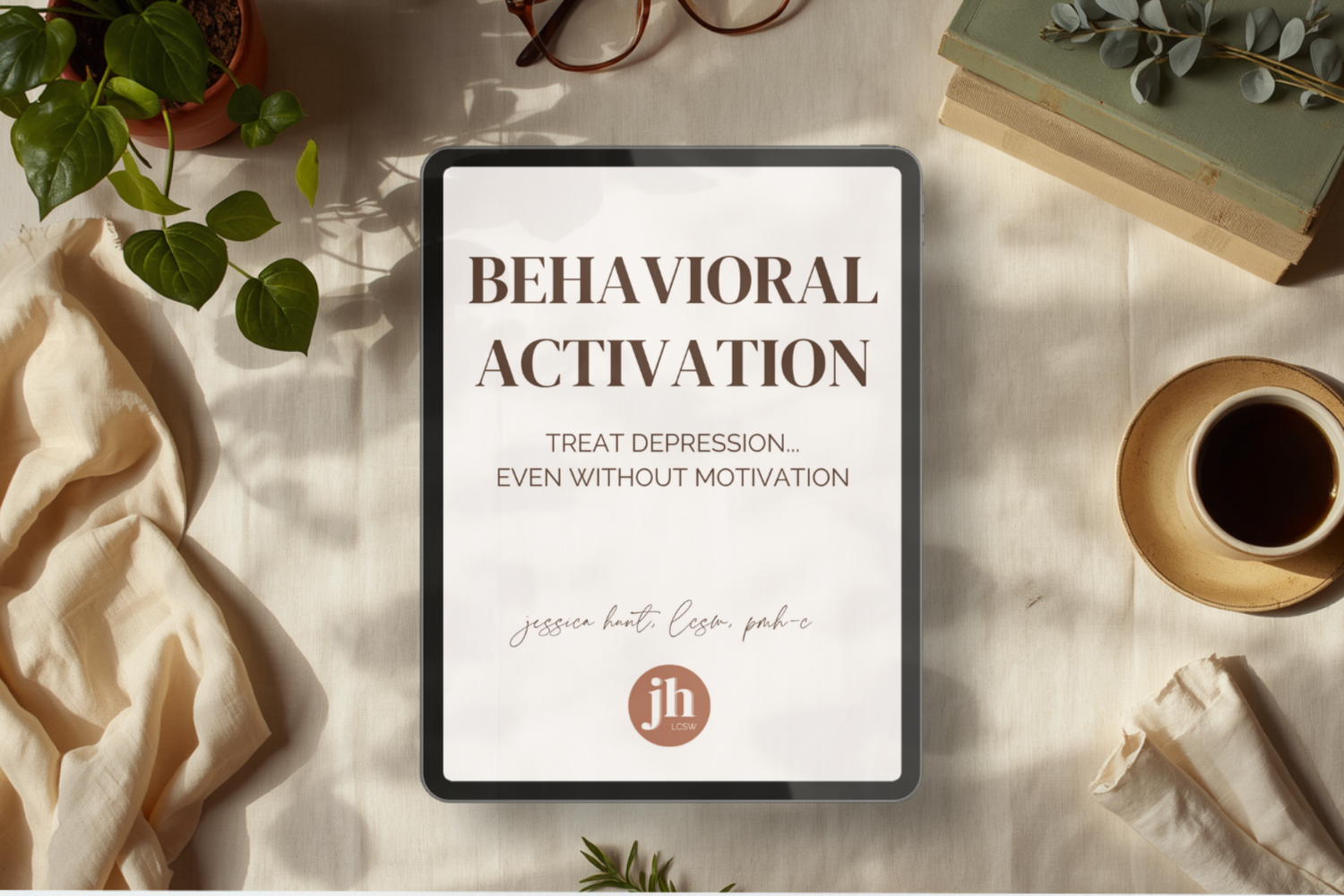 Behavioral Activation workbook cover on a tablet with soft linen background and greenery, free editable PDF for treating depression and building momentum by Jessica Hunt LCSW