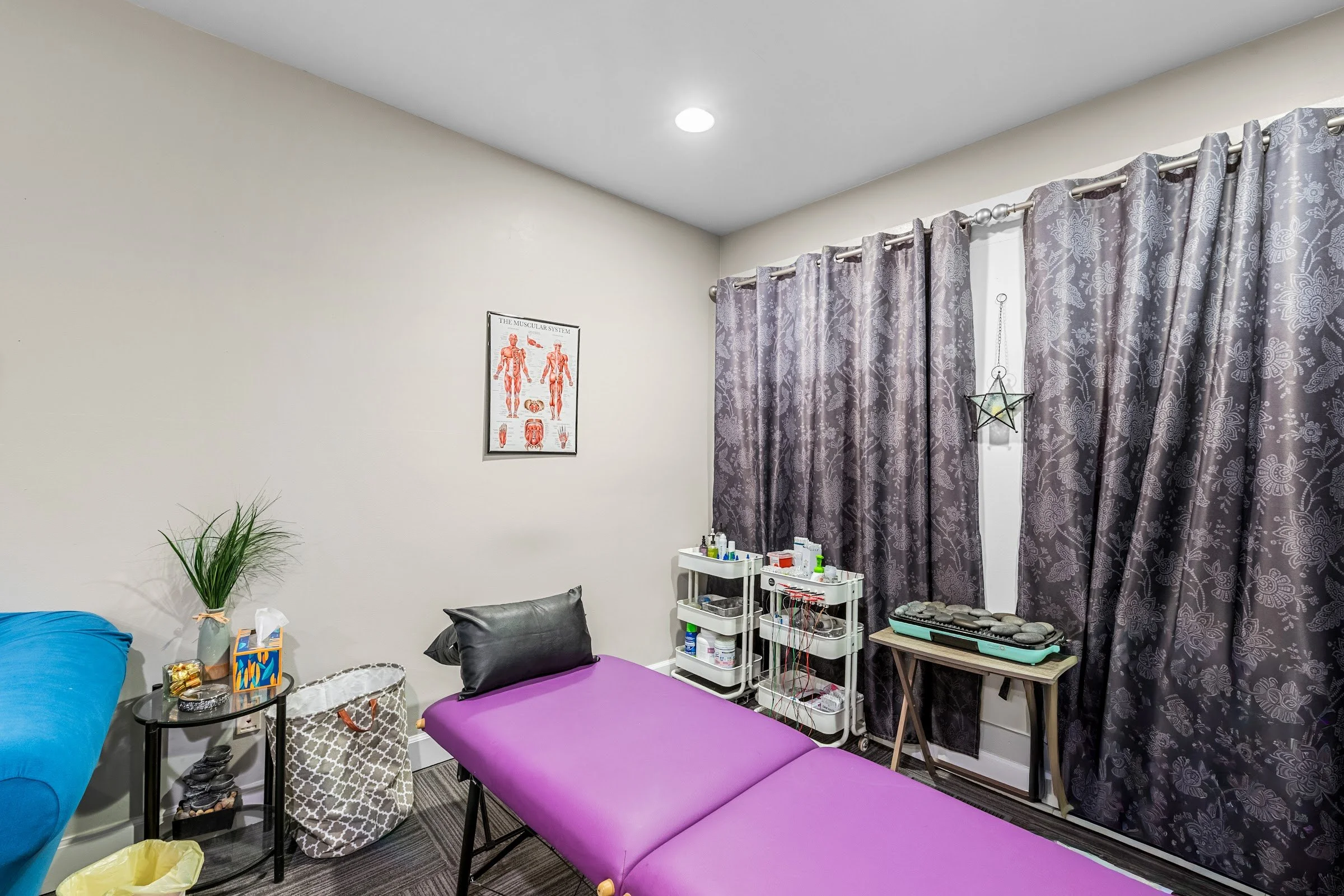 Treatment table in the Summit Physio pop-up room at CrossFit Hellkite
