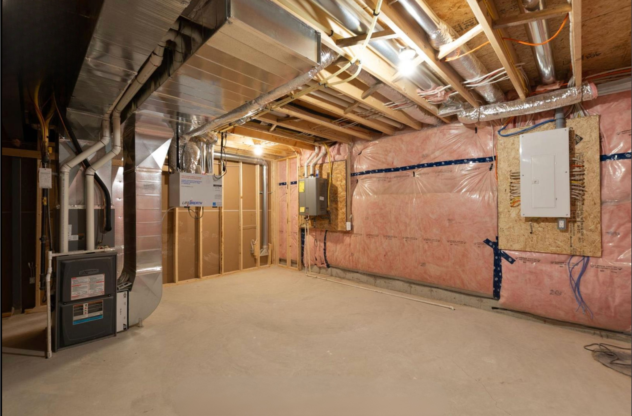 Introducing The Serenity, being built on Lot 11: a luxurious 1-floor bungalow on a 55x128 ft pool-sized lot with a triple car garage, priced at $939,900. This open-concept home features a designer kitchen, great room with gas fireplace, master suite 