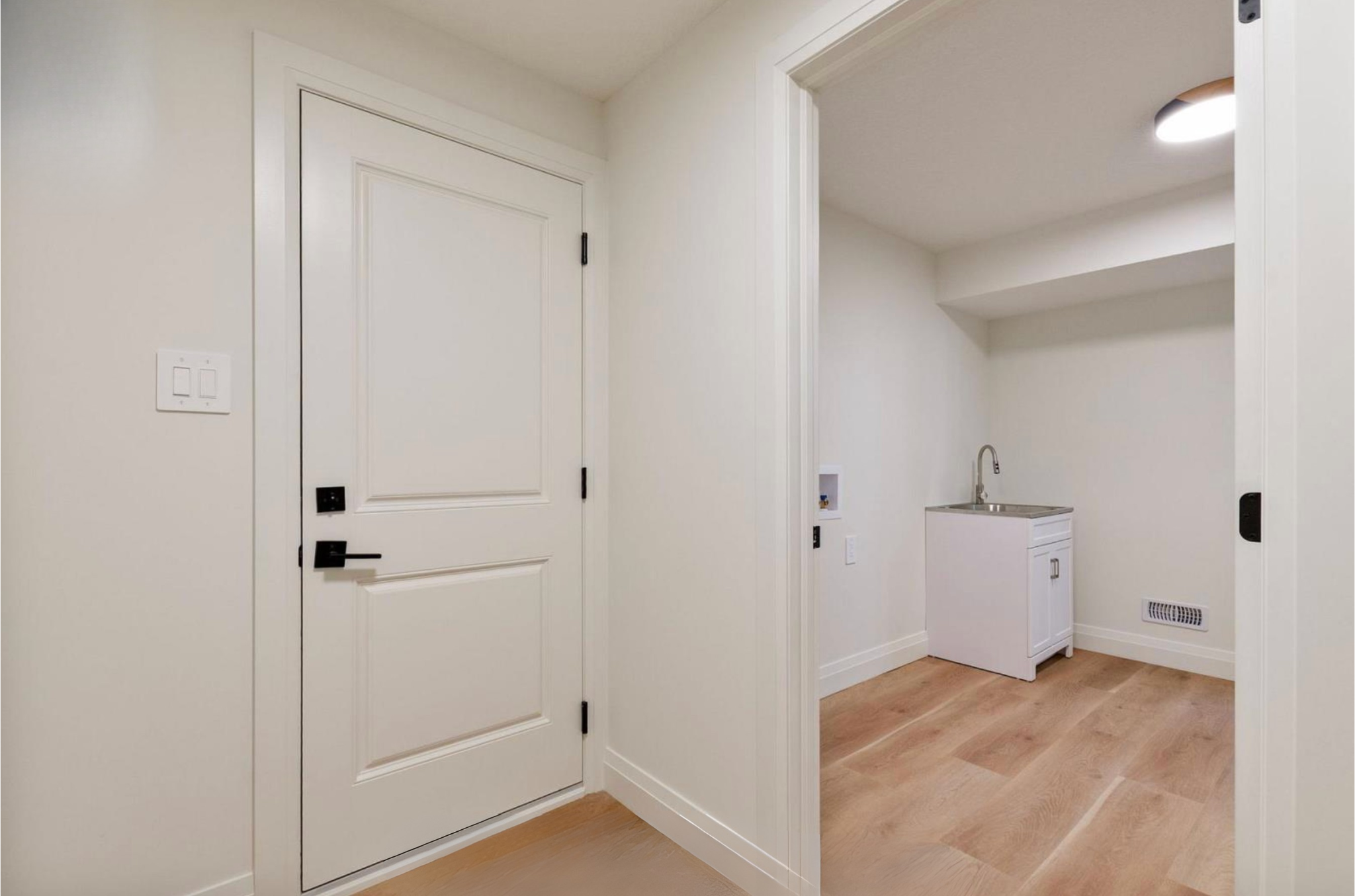 Introducing The Serenity, being built on Lot 11: a luxurious 1-floor bungalow on a 55x128 ft pool-sized lot with a triple car garage, priced at $939,900. This open-concept home features a designer kitchen, great room with gas fireplace, master suite 