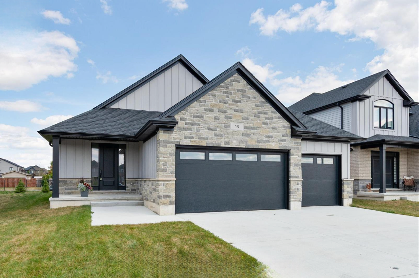 Introducing The Serenity, being built on Lot 11: a luxurious 1-floor bungalow on a 55x128 ft pool-sized lot with a triple car garage, priced at $939,900. This open-concept home features a designer kitchen, great room with gas fireplace, master suite 