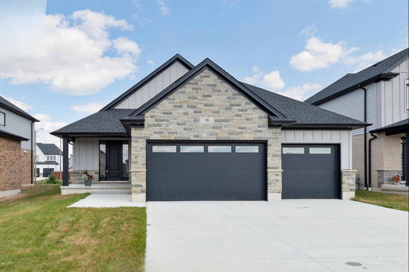 Introducing The Serenity, being built on Lot 11: a luxurious 1-floor bungalow on a 55x128 ft pool-sized lot with a triple car garage, priced at $939,900. This open-concept home features a designer kitchen, great room with gas fireplace, master suite 