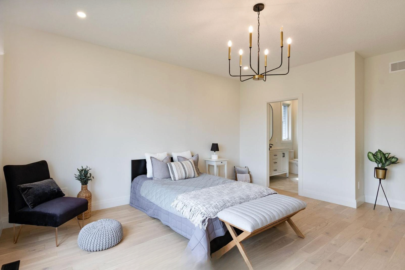 Introducing The Serenity, being built on Lot 11: a luxurious 1-floor bungalow on a 55x128 ft pool-sized lot with a triple car garage, priced at $939,900. This open-concept home features a designer kitchen, great room with gas fireplace, master suite 