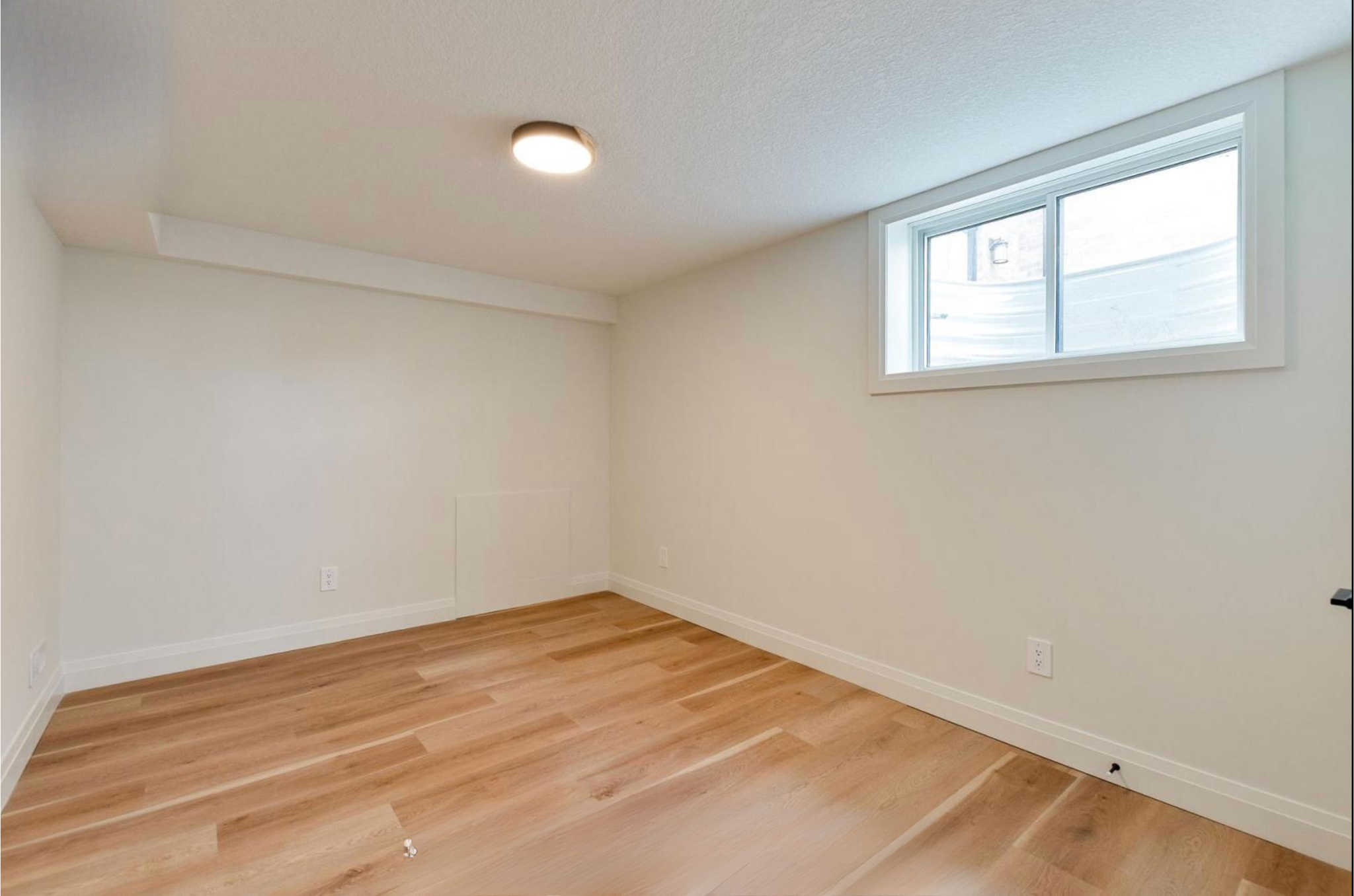 Introducing The Serenity, being built on Lot 11: a luxurious 1-floor bungalow on a 55x128 ft pool-sized lot with a triple car garage, priced at $939,900. This open-concept home features a designer kitchen, great room with gas fireplace, master suite 