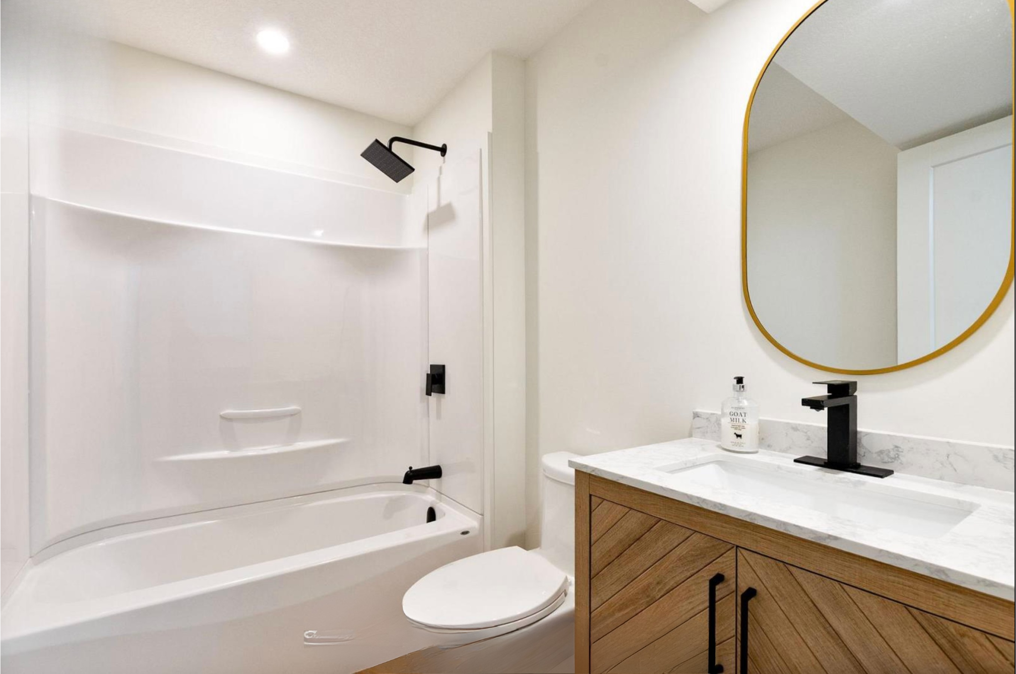 Introducing The Serenity, being built on Lot 11: a luxurious 1-floor bungalow on a 55x128 ft pool-sized lot with a triple car garage, priced at $939,900. This open-concept home features a designer kitchen, great room with gas fireplace, master suite 