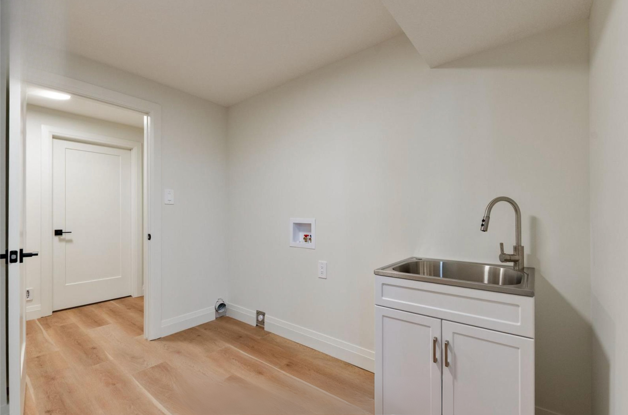 Introducing The Serenity, being built on Lot 11: a luxurious 1-floor bungalow on a 55x128 ft pool-sized lot with a triple car garage, priced at $939,900. This open-concept home features a designer kitchen, great room with gas fireplace, master suite 