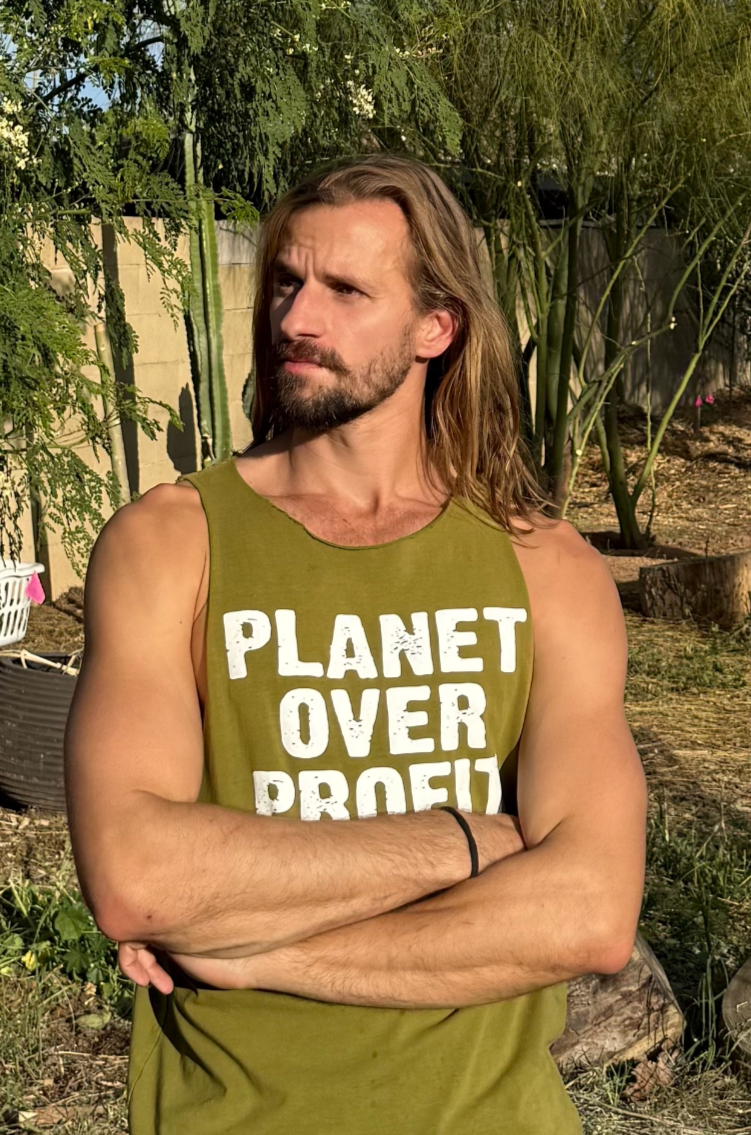 Jérémy Chevallier wearing a straw hat and bandana, smiling outdoors at the Salt River near Phoenix Arizona