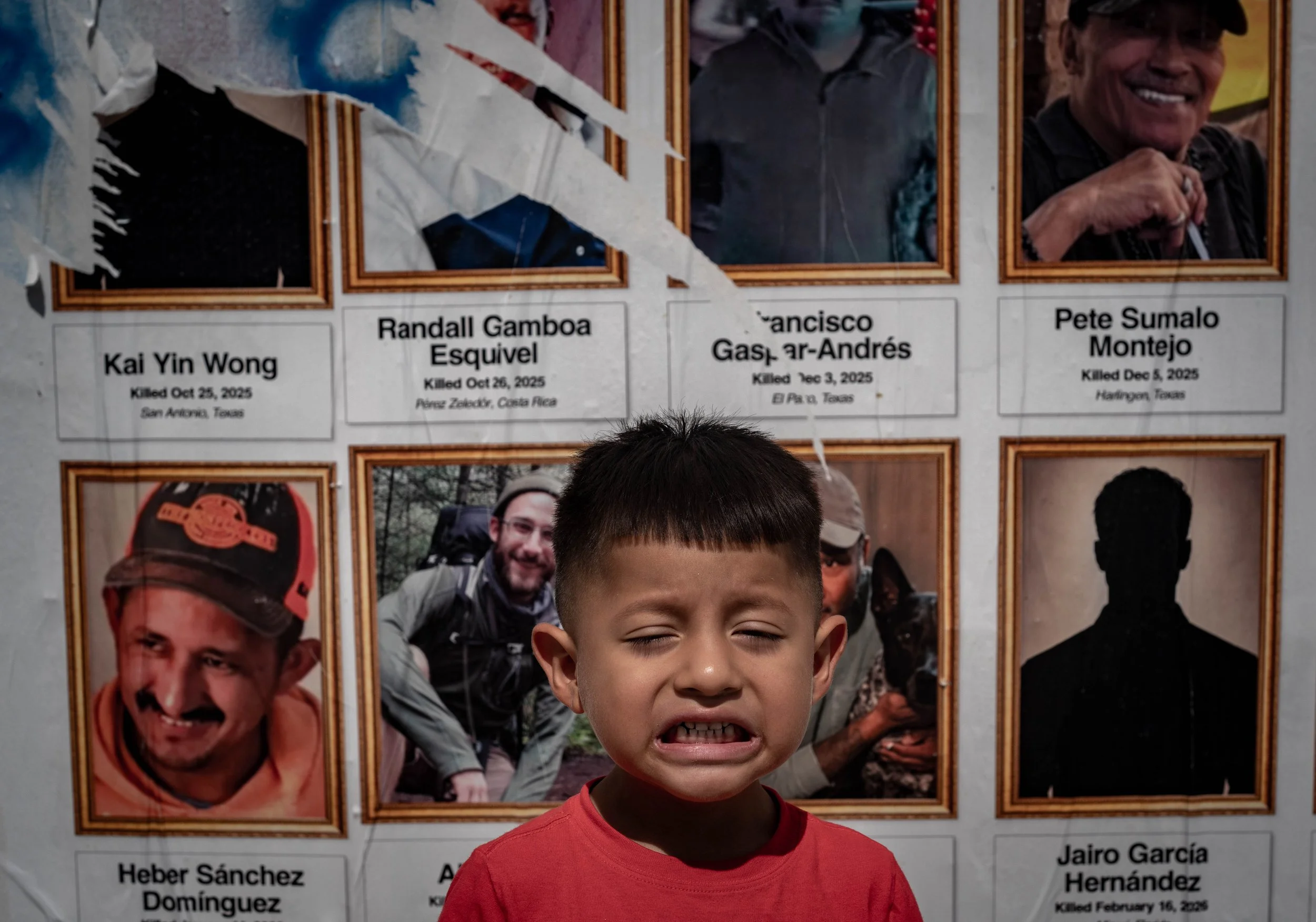 Kid w ICE Death Posters.jpg