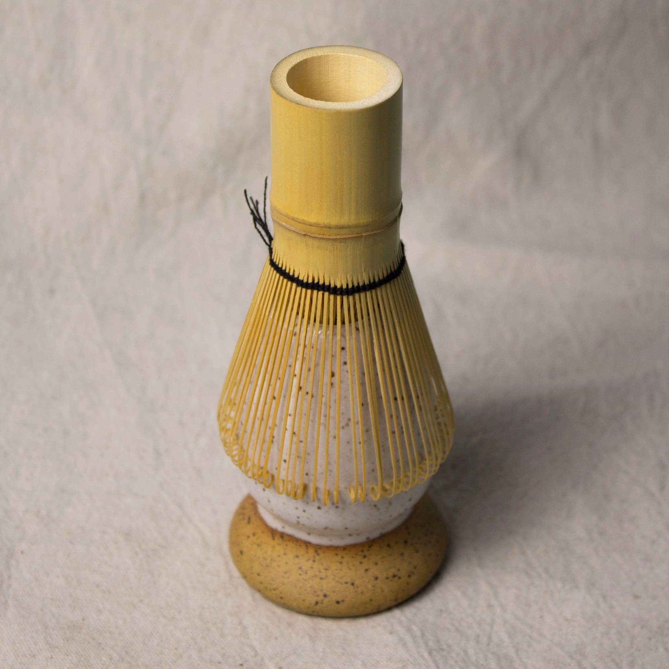 Handmade stoneware matcha whisk holder (chasen stand) that keeps your bamboo whisk’s shape. Dishwasher safe. Made by hand in Denver, CO by Castor Ceramics.