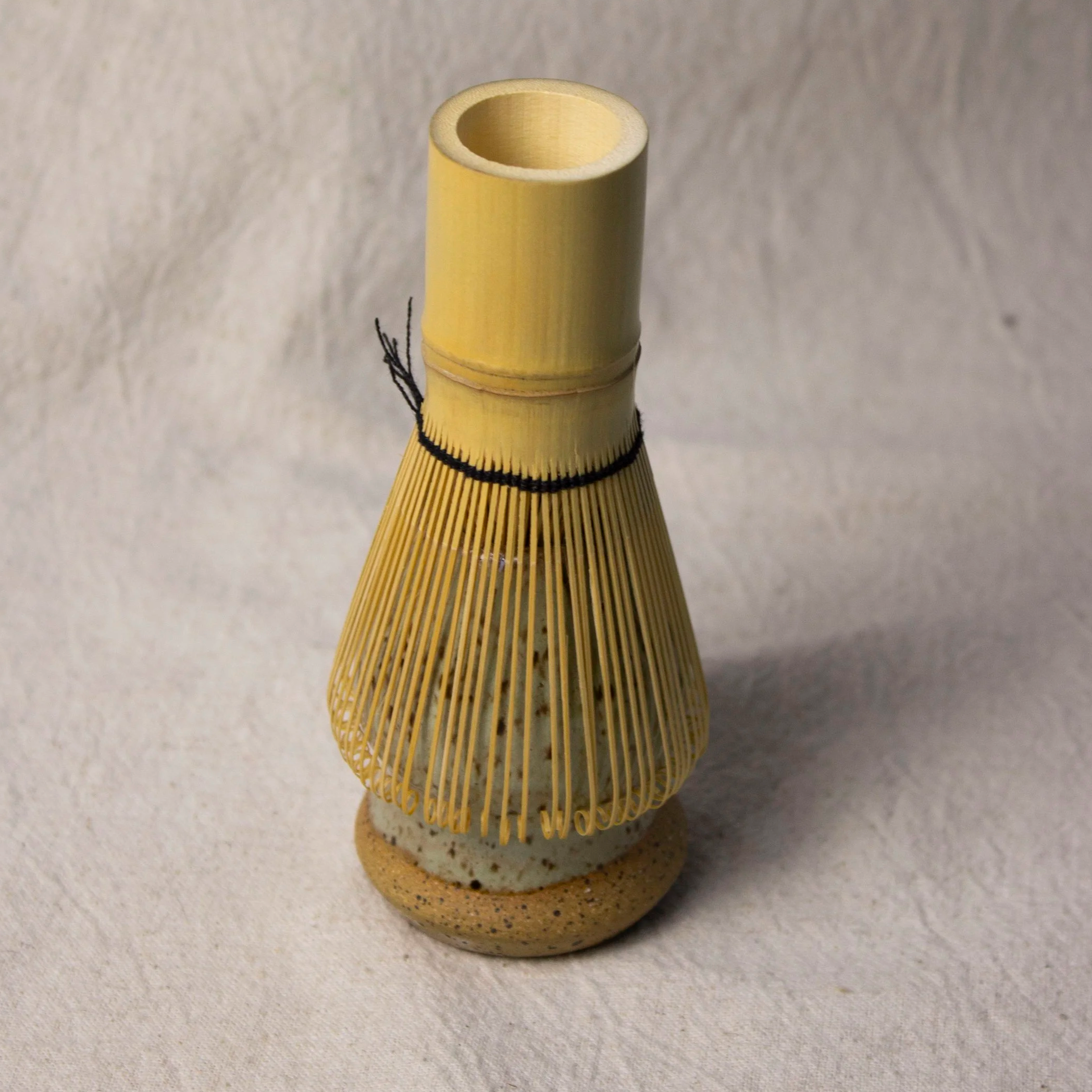 Handmade stoneware matcha whisk holder (chasen stand) that keeps your bamboo whisk’s shape. Dishwasher safe. Made by hand in Denver, CO by Castor Ceramics.