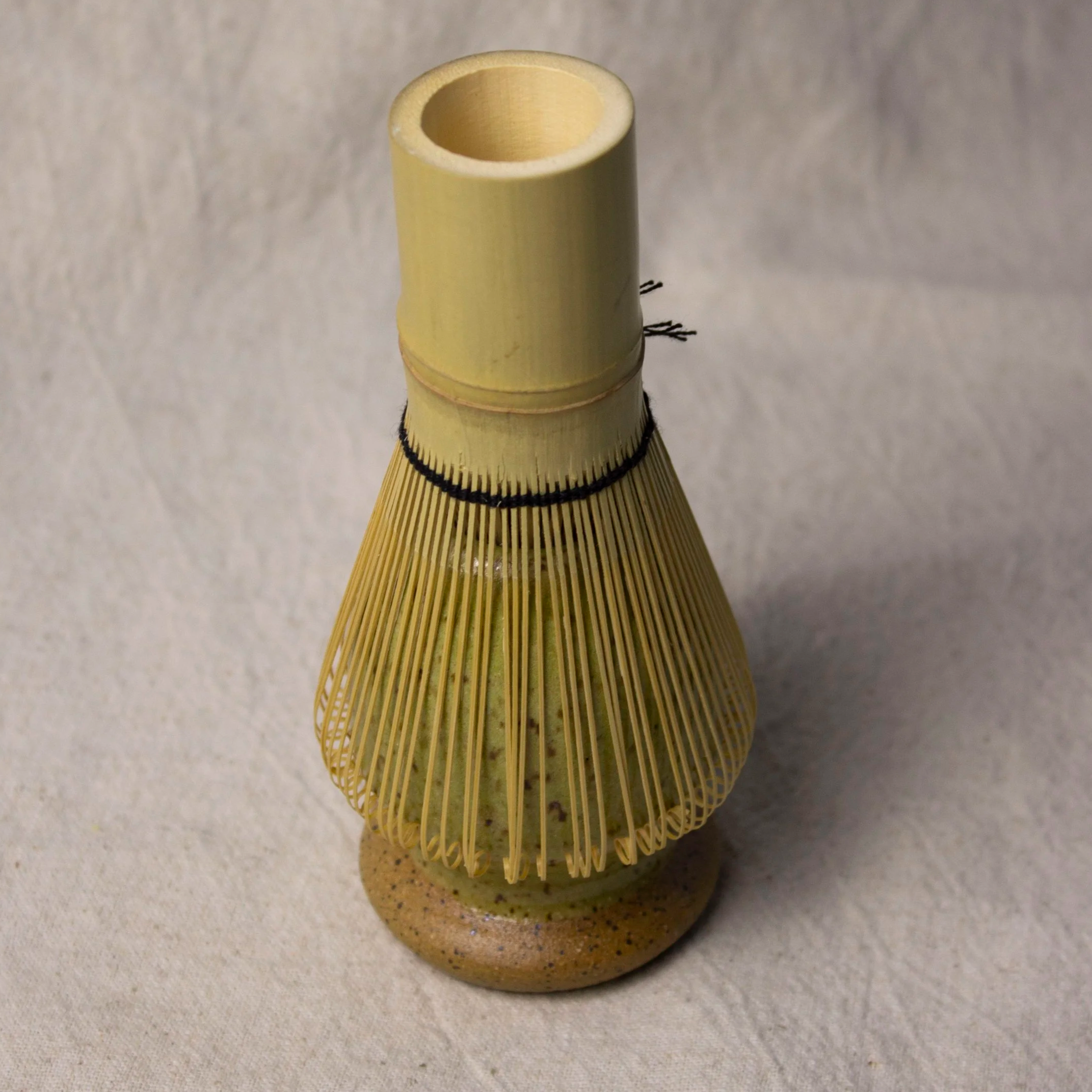 Handmade stoneware matcha whisk holder (chasen stand) that keeps your bamboo whisk’s shape. Dishwasher safe. Made by hand in Denver, CO by Castor Ceramics.
