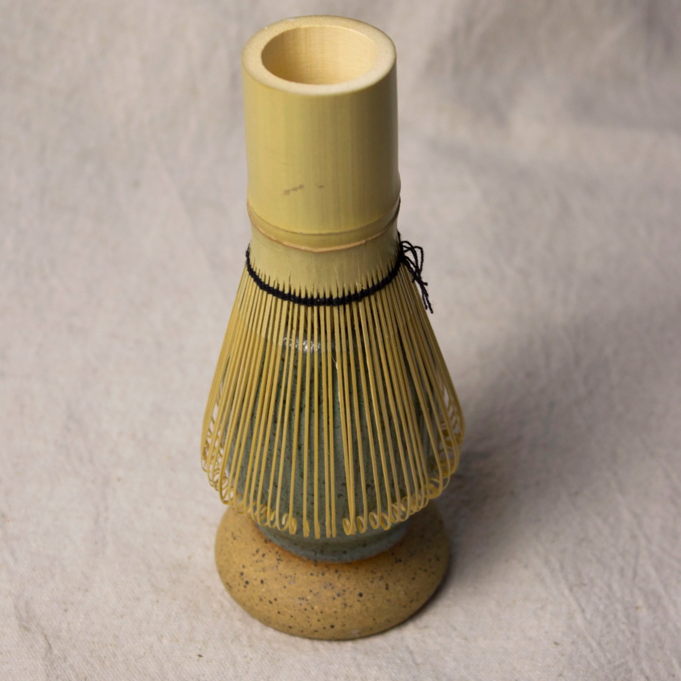 Handmade stoneware matcha whisk holder (chasen stand) that keeps your bamboo whisk’s shape. Dishwasher safe. Made by hand in Denver, CO by Castor Ceramics.