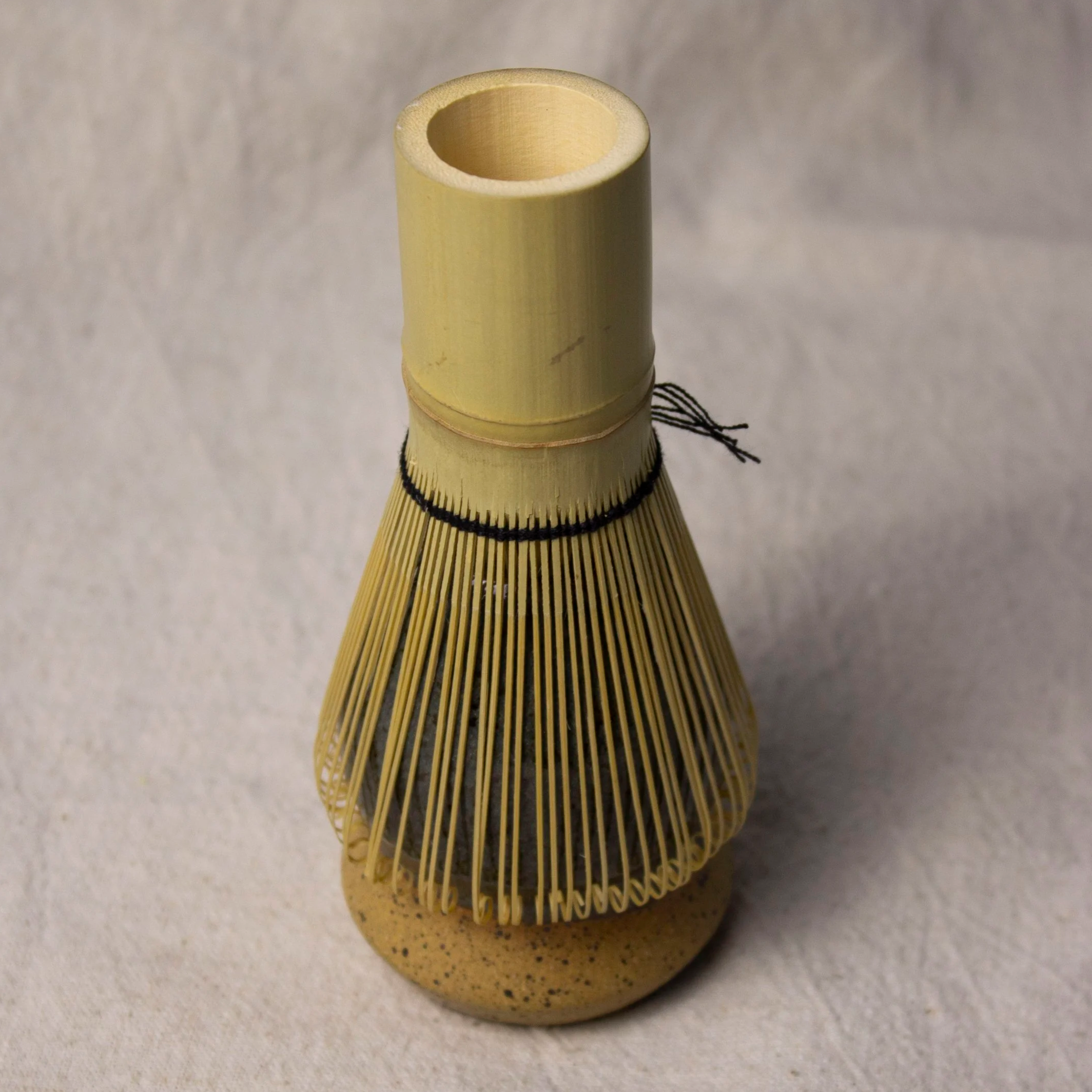 Handmade stoneware matcha whisk holder (chasen stand) that keeps your bamboo whisk’s shape. Dishwasher safe. Made by hand in Denver, CO by Castor Ceramics.