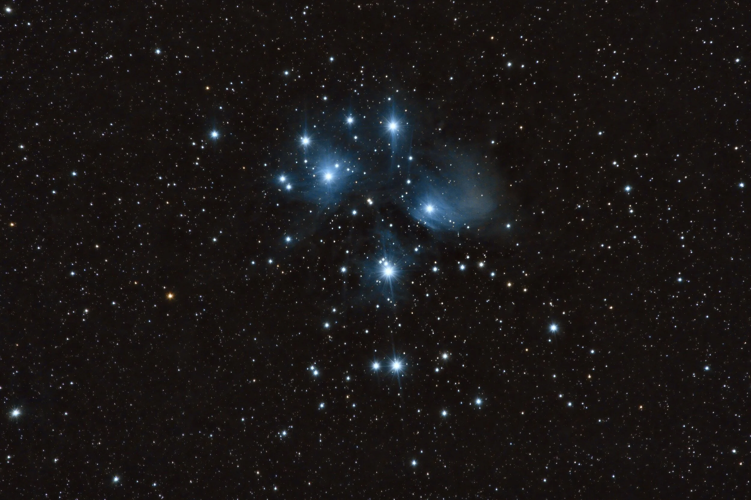 An image of the famous Pleiades nebula, as an example of deep space photography.