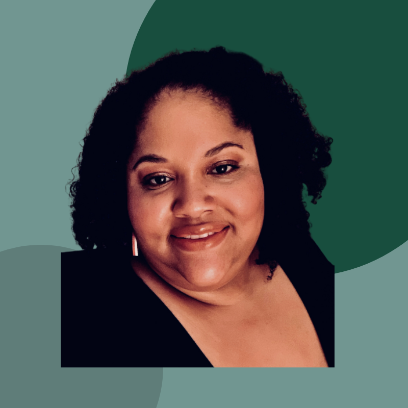 A woman with curly black hair smiling, wearing a black top and hoop earrings, against a background with green abstract shapes.